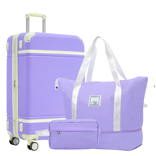 Purple hardside spinner suitcase with ivory trim and matching duffel bag