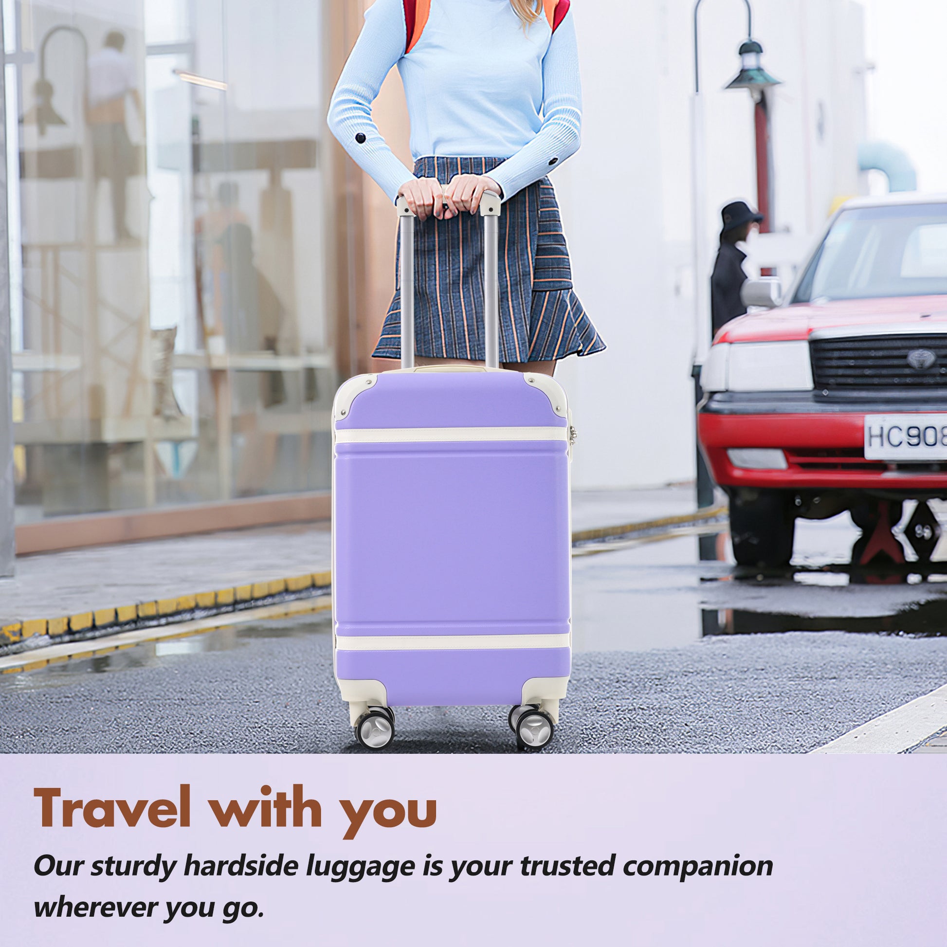Purple hardside luggage with white trim featuring spinner wheels for easy travel