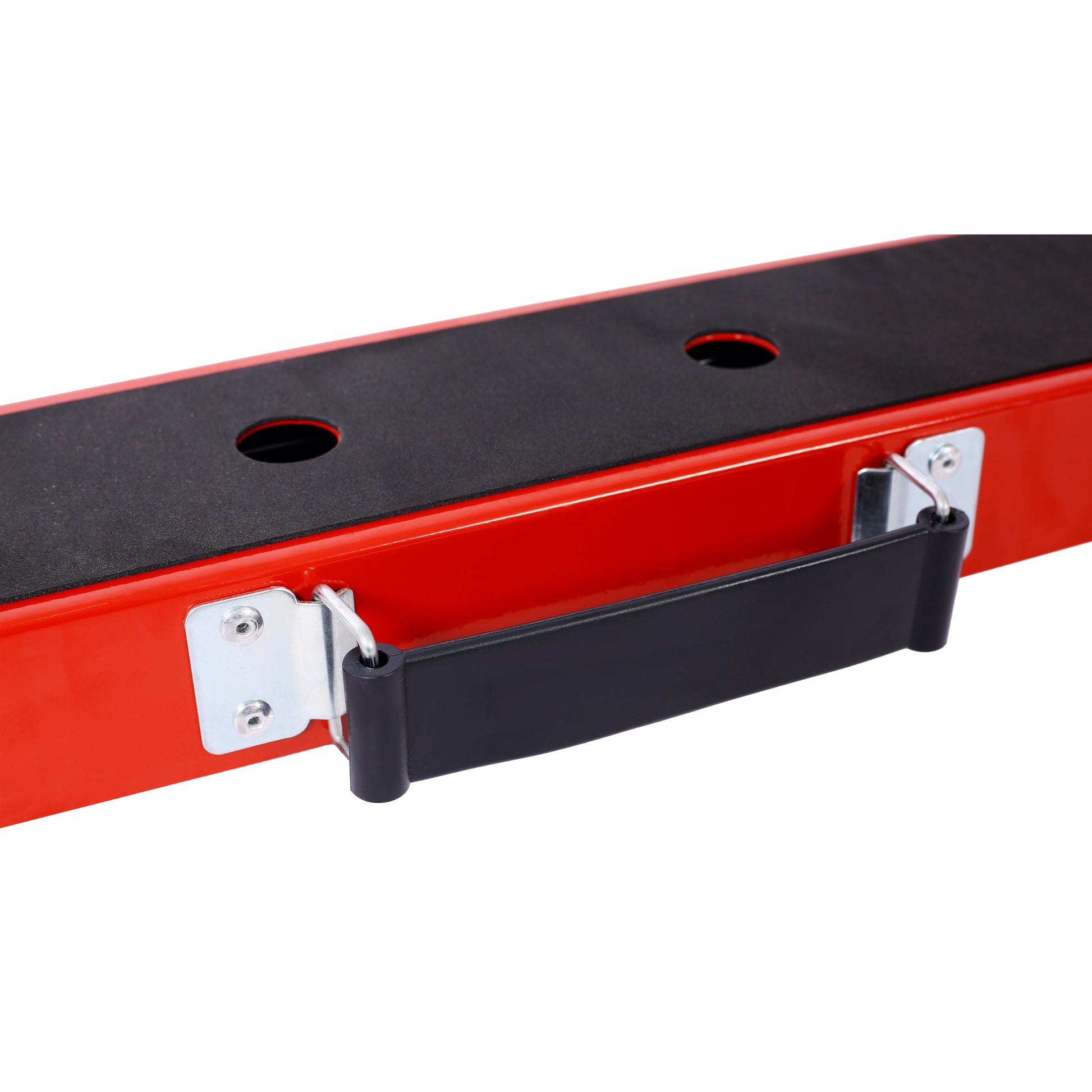 Red metal workout bench with black grip handle and textured footrest