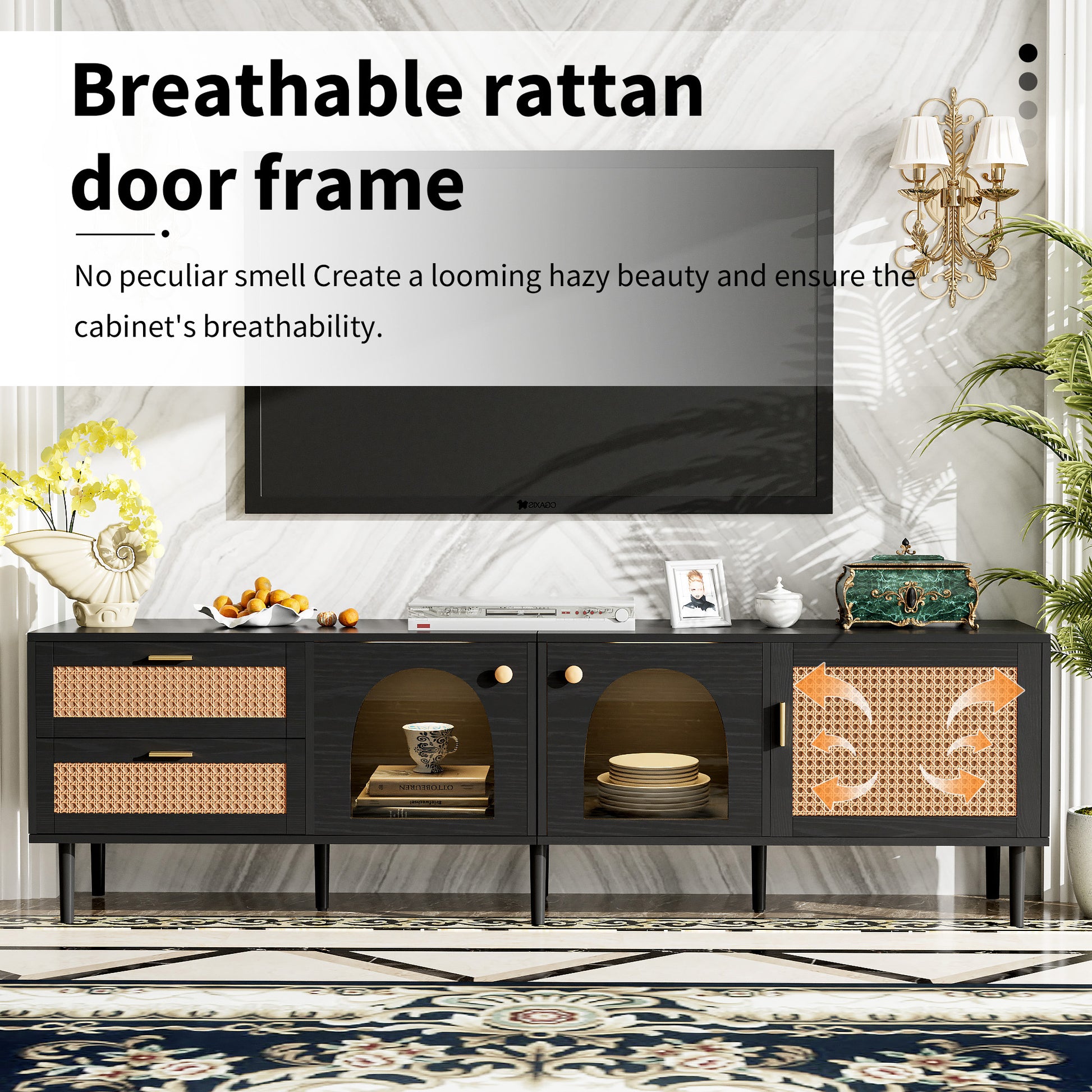 Black media console with rattan cabinet doors and brass handles