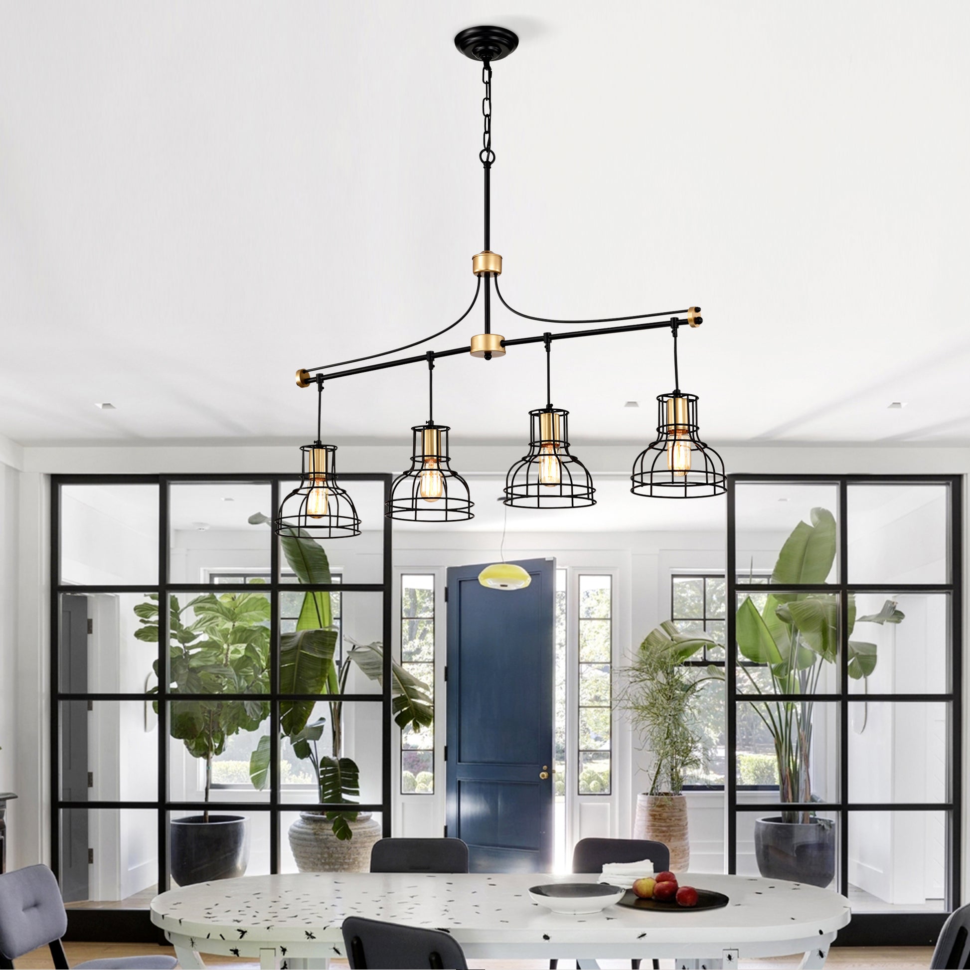 Black and gold Sputnik chandelier with four caged bulbs perfect for dining rooms