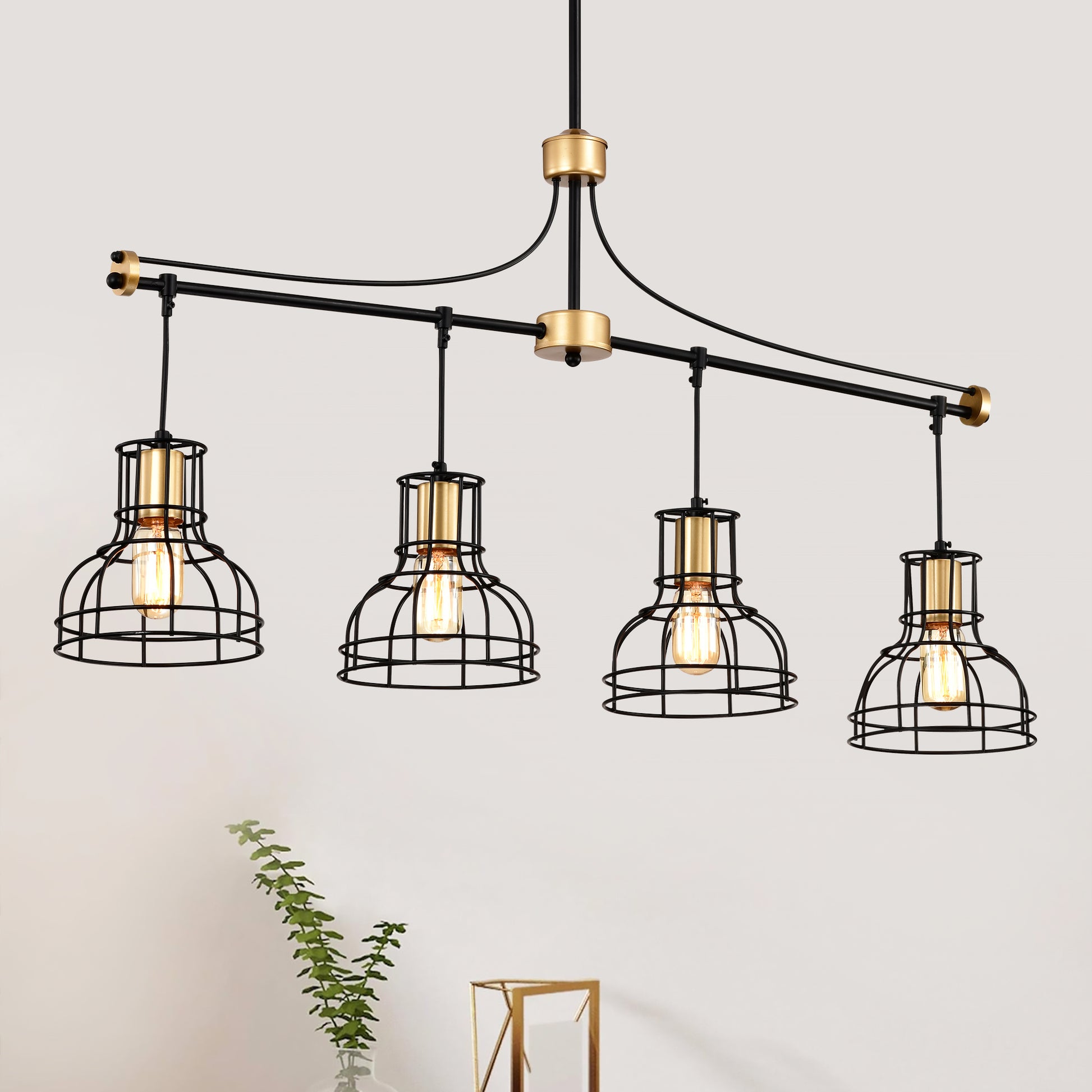 Black and gold industrial chandelier with four cage lights and Edison bulbs
