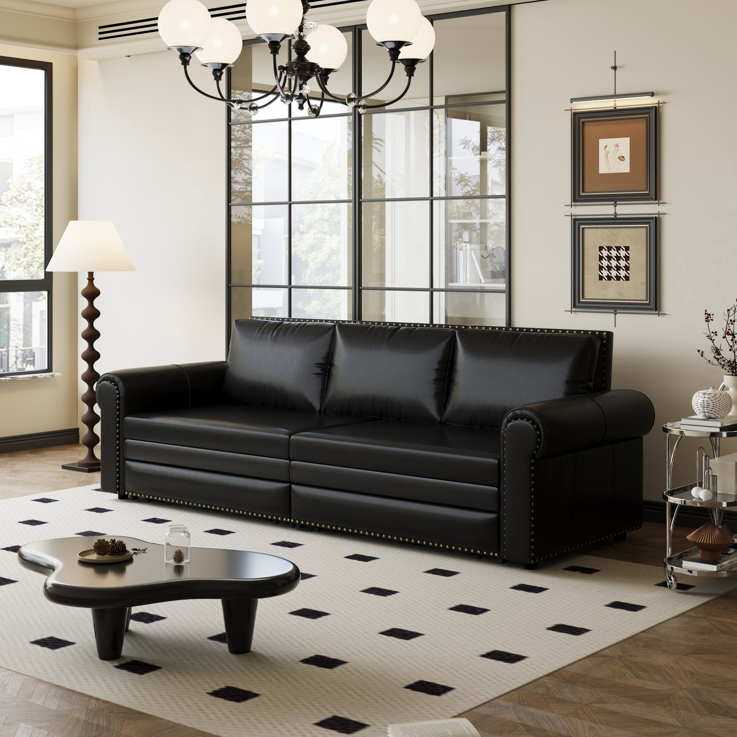 A modern black leather sofa with studded detailing and a tufted backrest