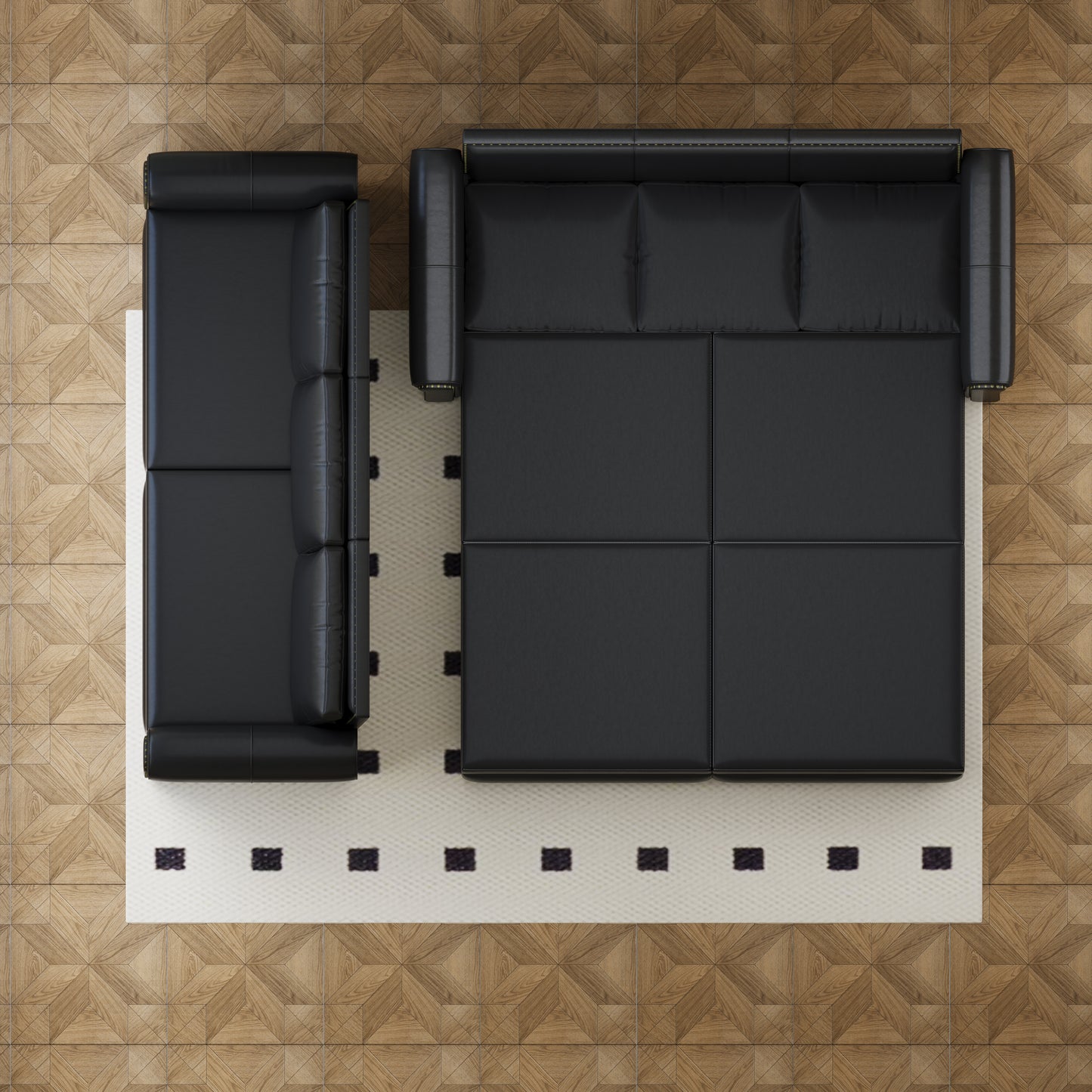 Black leather sectional sofa with tufted cushions and polished metal accents