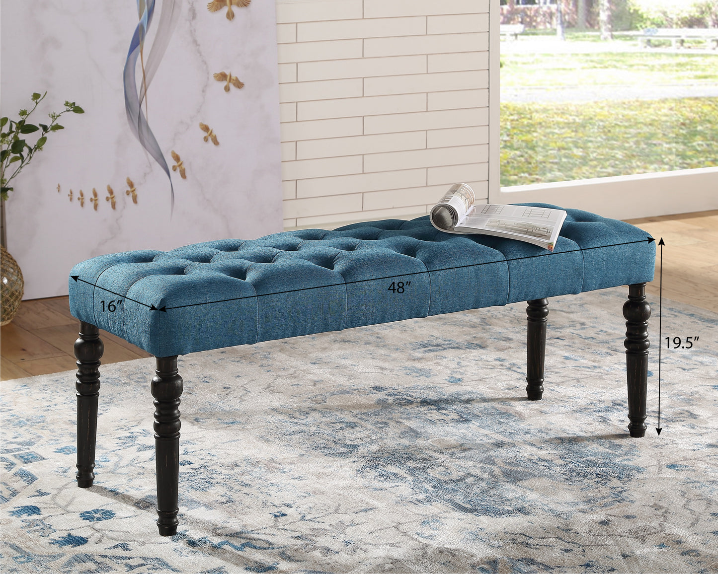 Tufted navy blue linen bench with carved dark wood legs perfect for entryway seating