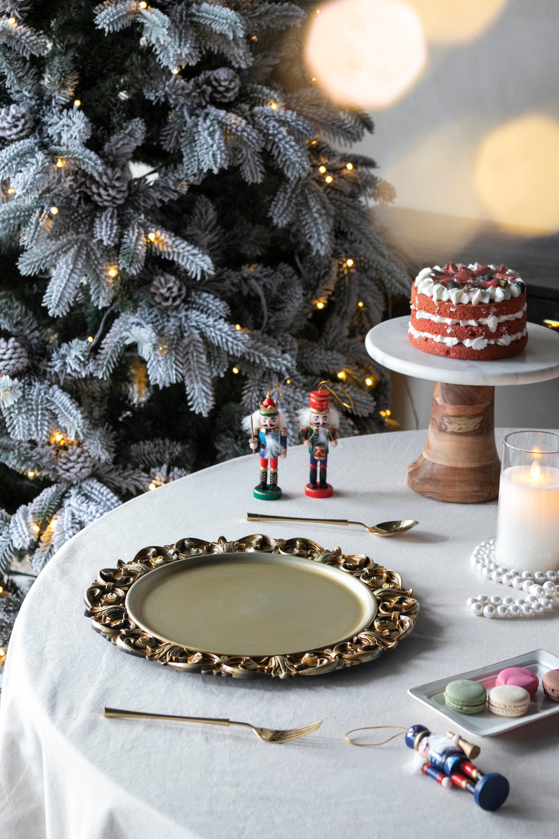 Festive red velvet cake with cream frosting and berry topping perfect for holiday celebrations