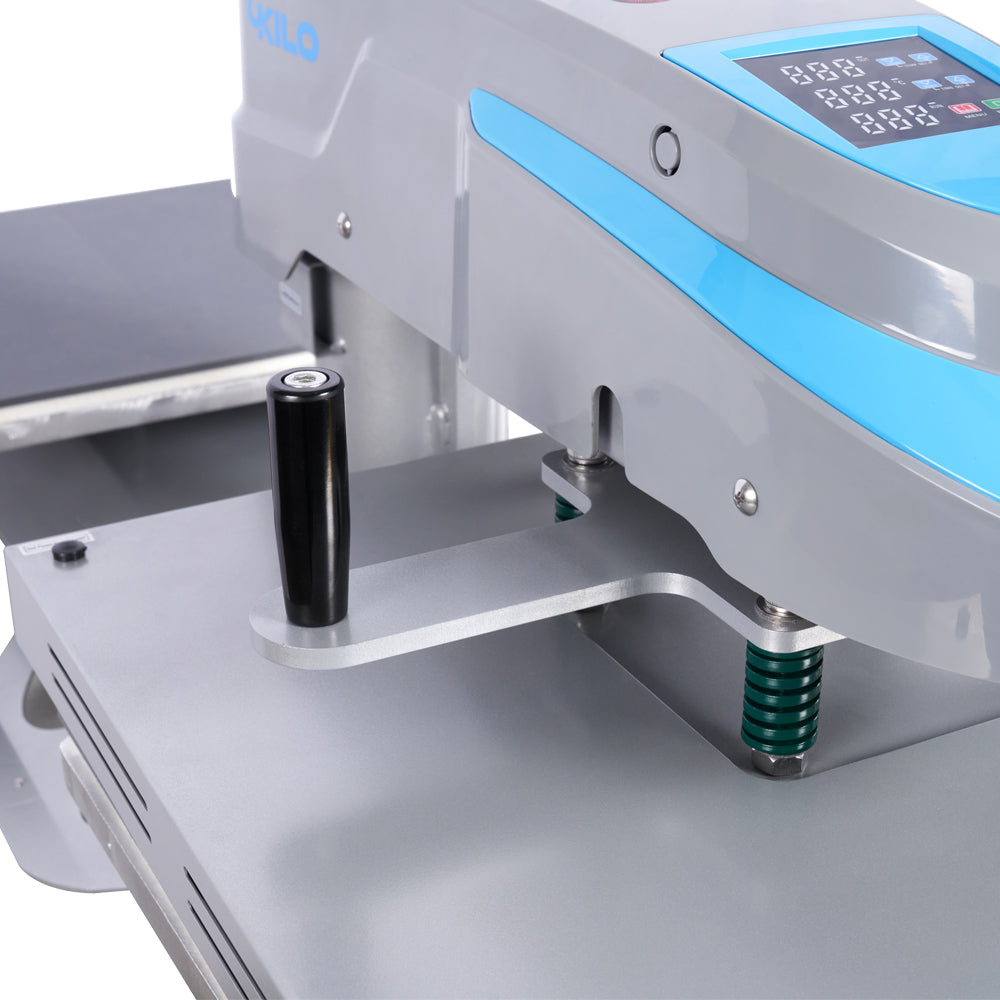 Closeup of a gray and blue heat press machine with digital display and black handle for sublimation printing