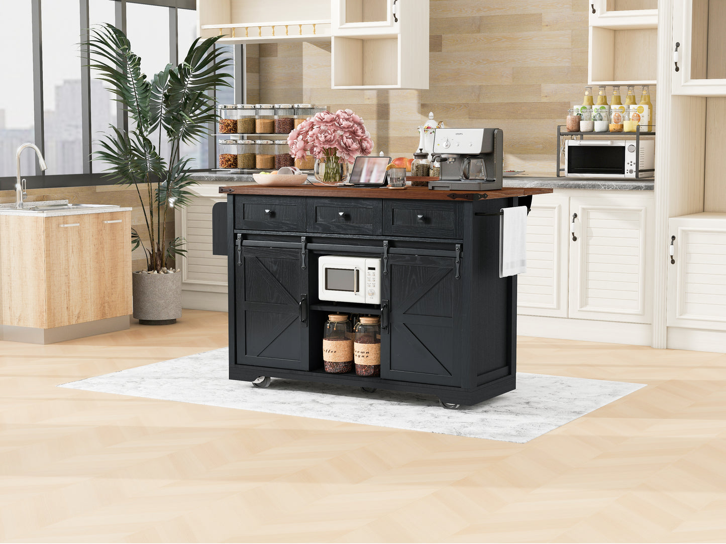 Black farmhouse kitchen island with sliding barn doors and microwave perfect for small kitchens
