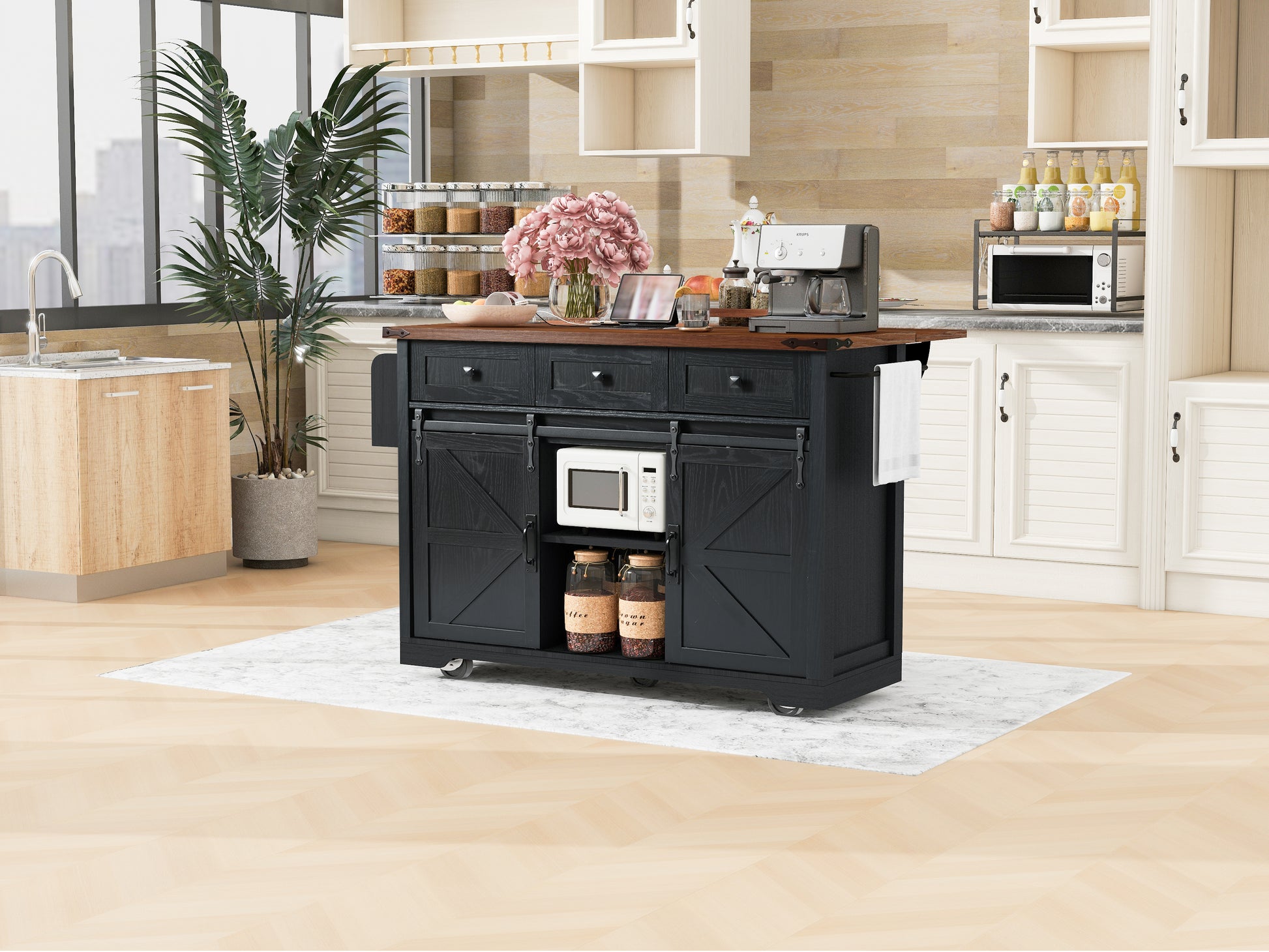 Black farmhouse kitchen island with sliding barn doors and microwave perfect for small kitchens