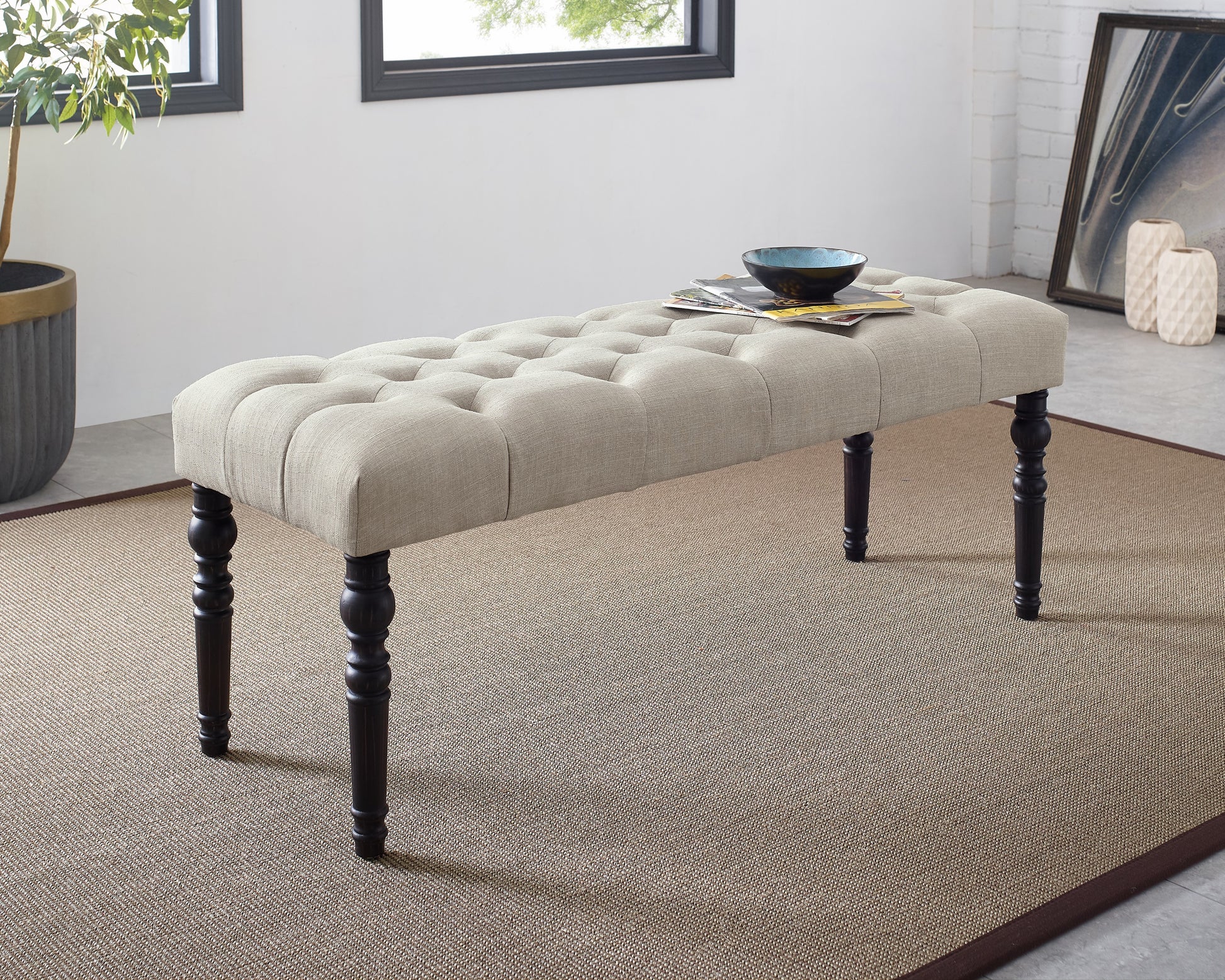 Tufted linen entryway bench in beige with dark wood legs