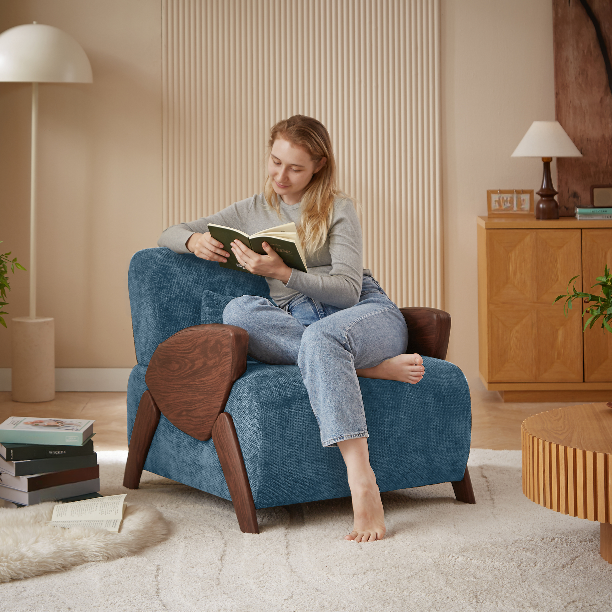 Teal textured fabric accent chair with dark wood accents perfect for reading