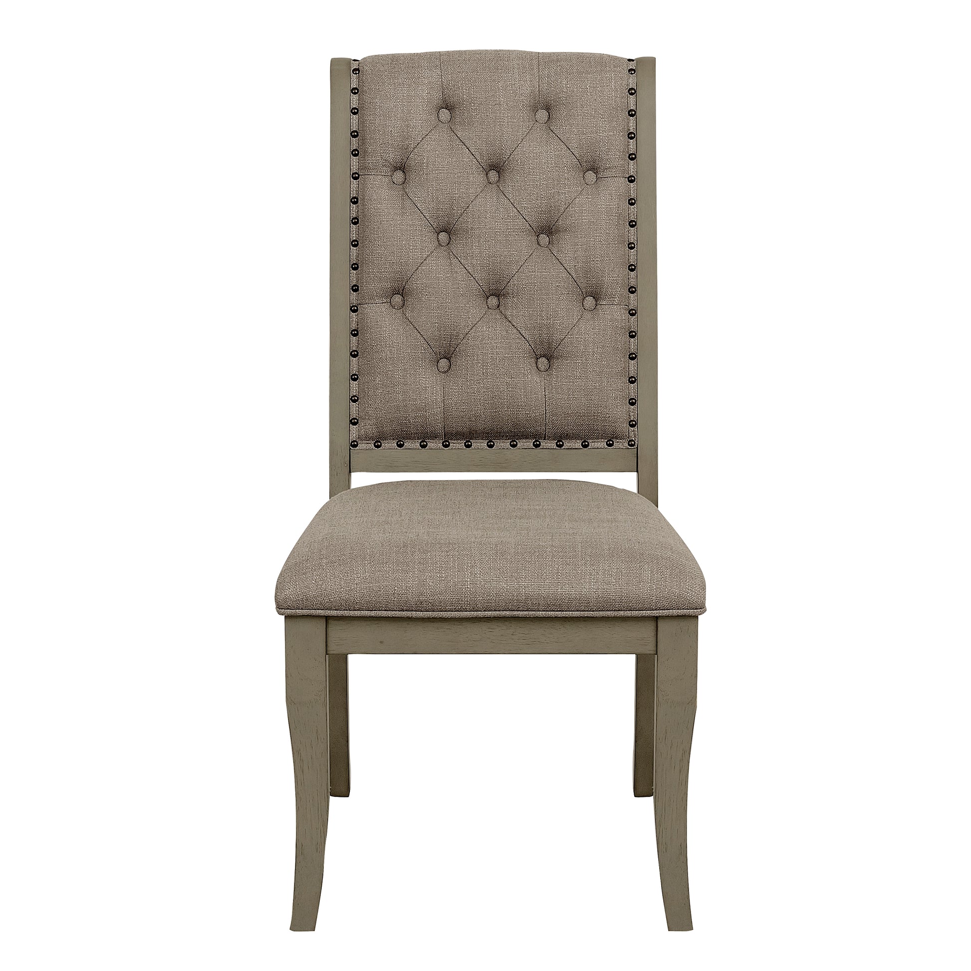Tufted beige fabric dining chair with nailhead trim and grey wood legs