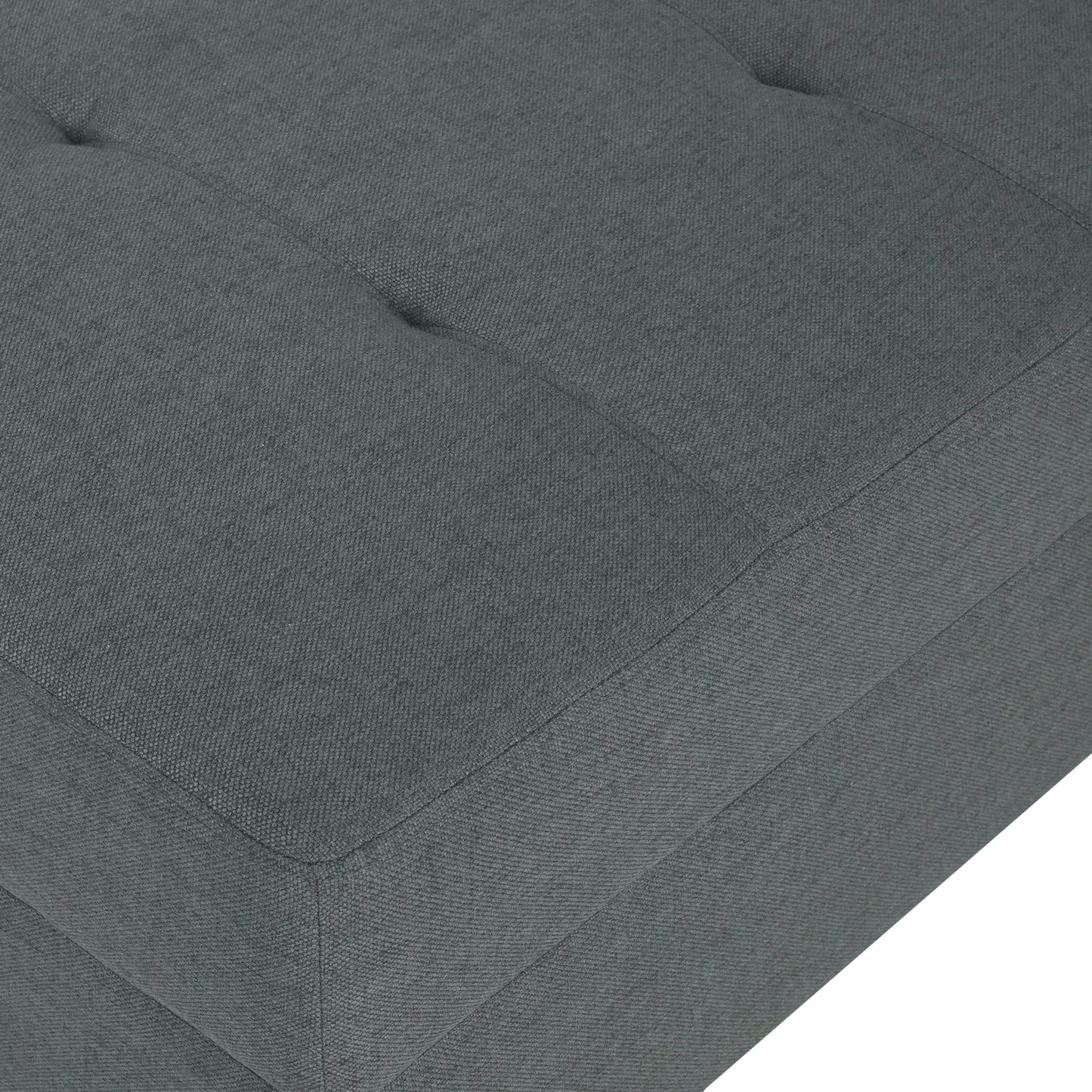 Tufted charcoal grey fabric ottoman with detailed stitching and button accents