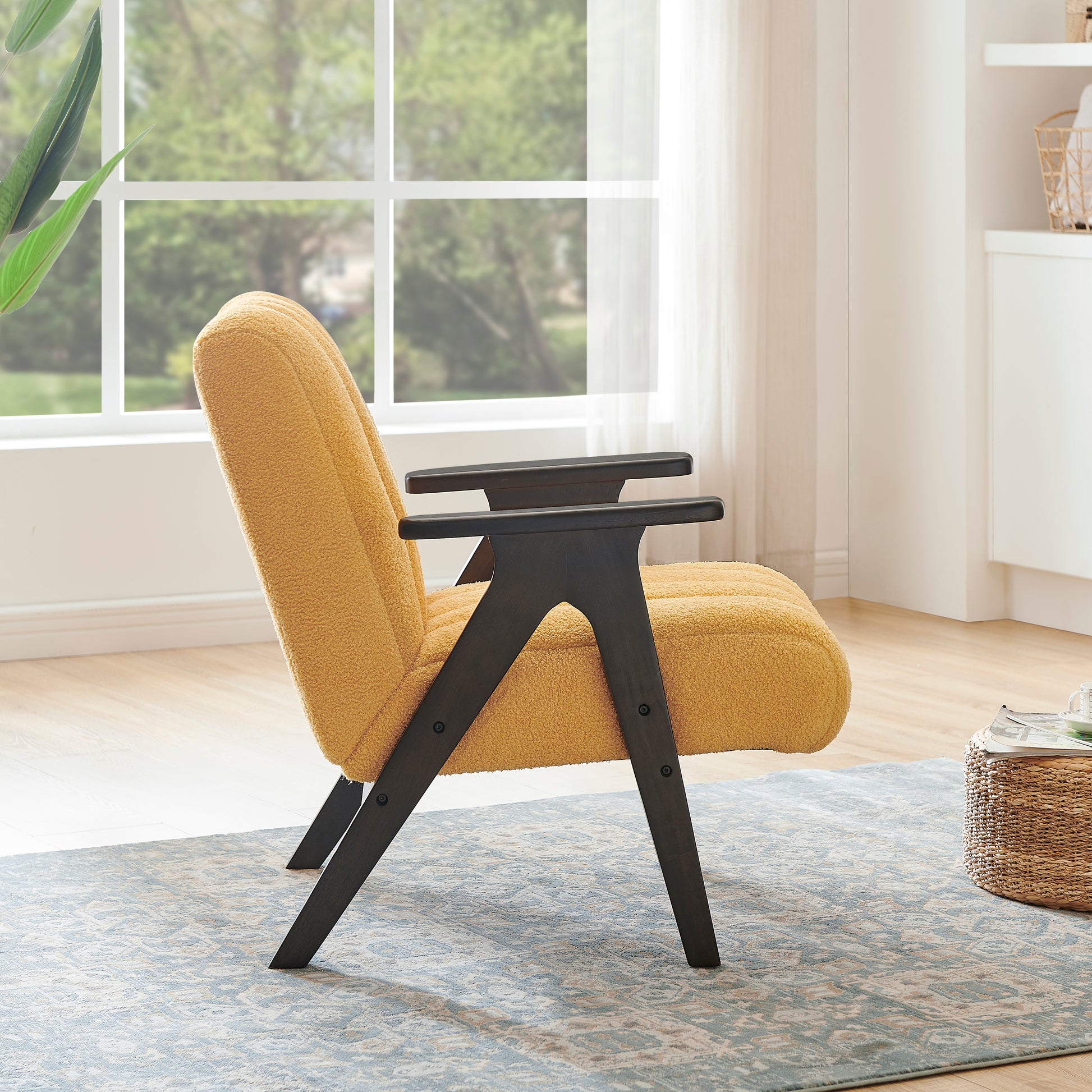 Mustard yellow boucle armchair with dark wood legs midcentury modern accent chair