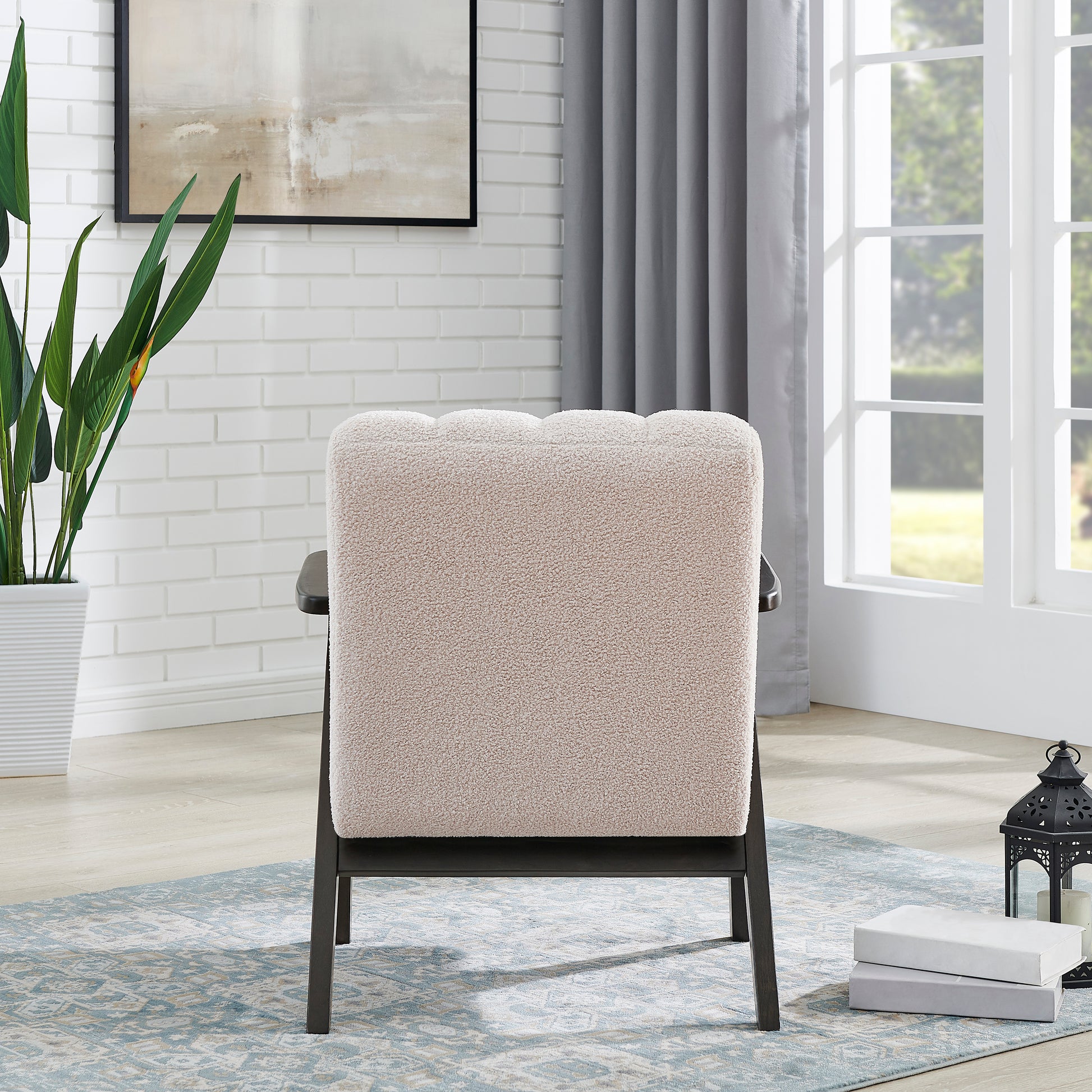 Cozy boucl accent chair in beige with dark wood frame perfect for living rooms