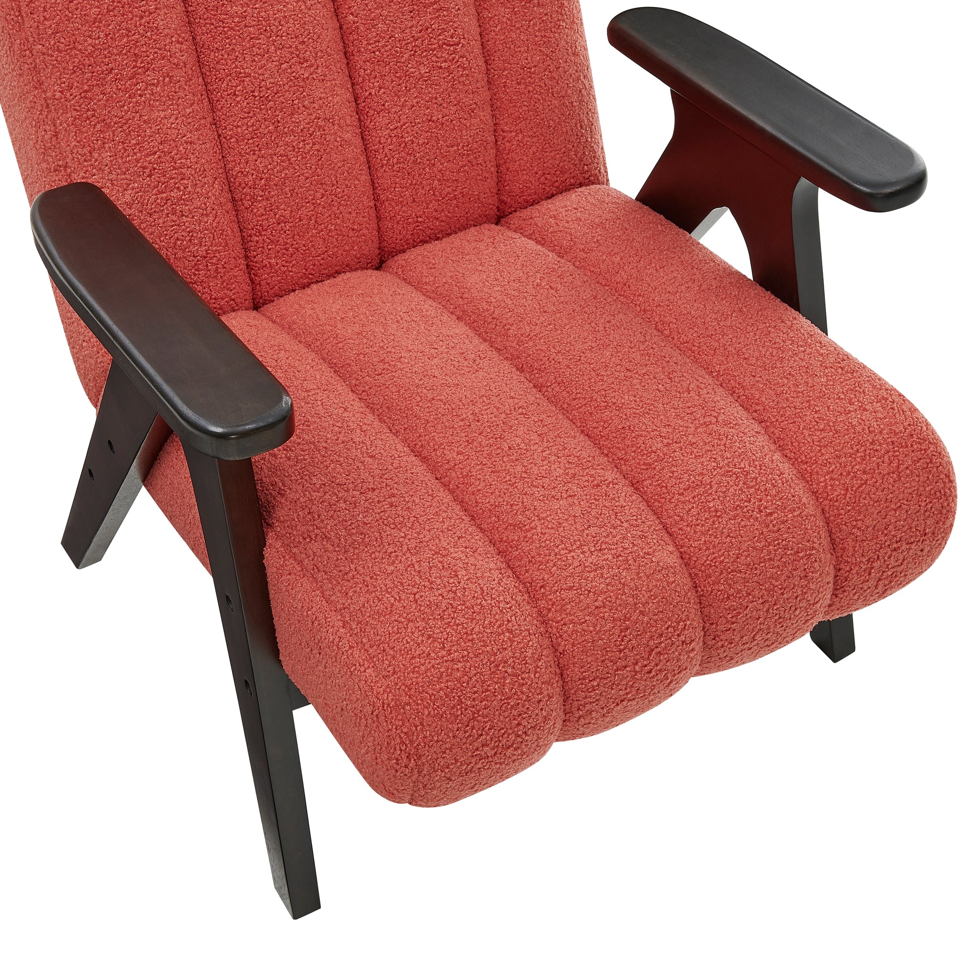 Coral boucl armchair with channel tufting and dark wood arms perfect for a living room accent