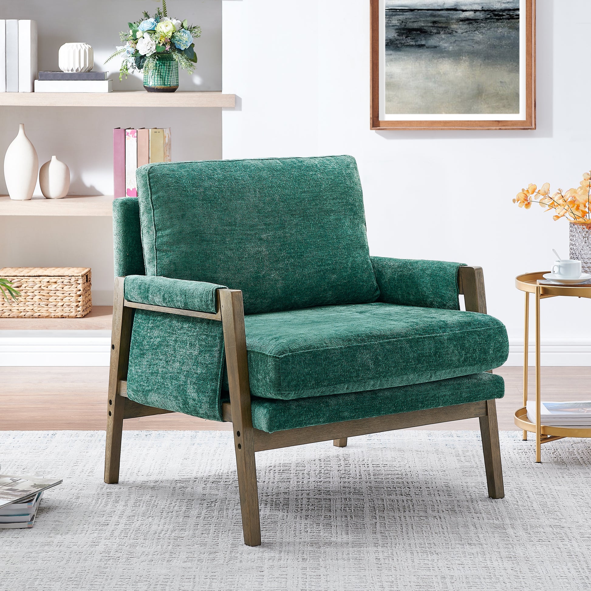 Emerald green accent chair with wooden frame and plush upholstery