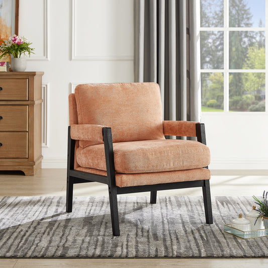 Orange textured accent chair with dark wood frame in a modern living room setting
