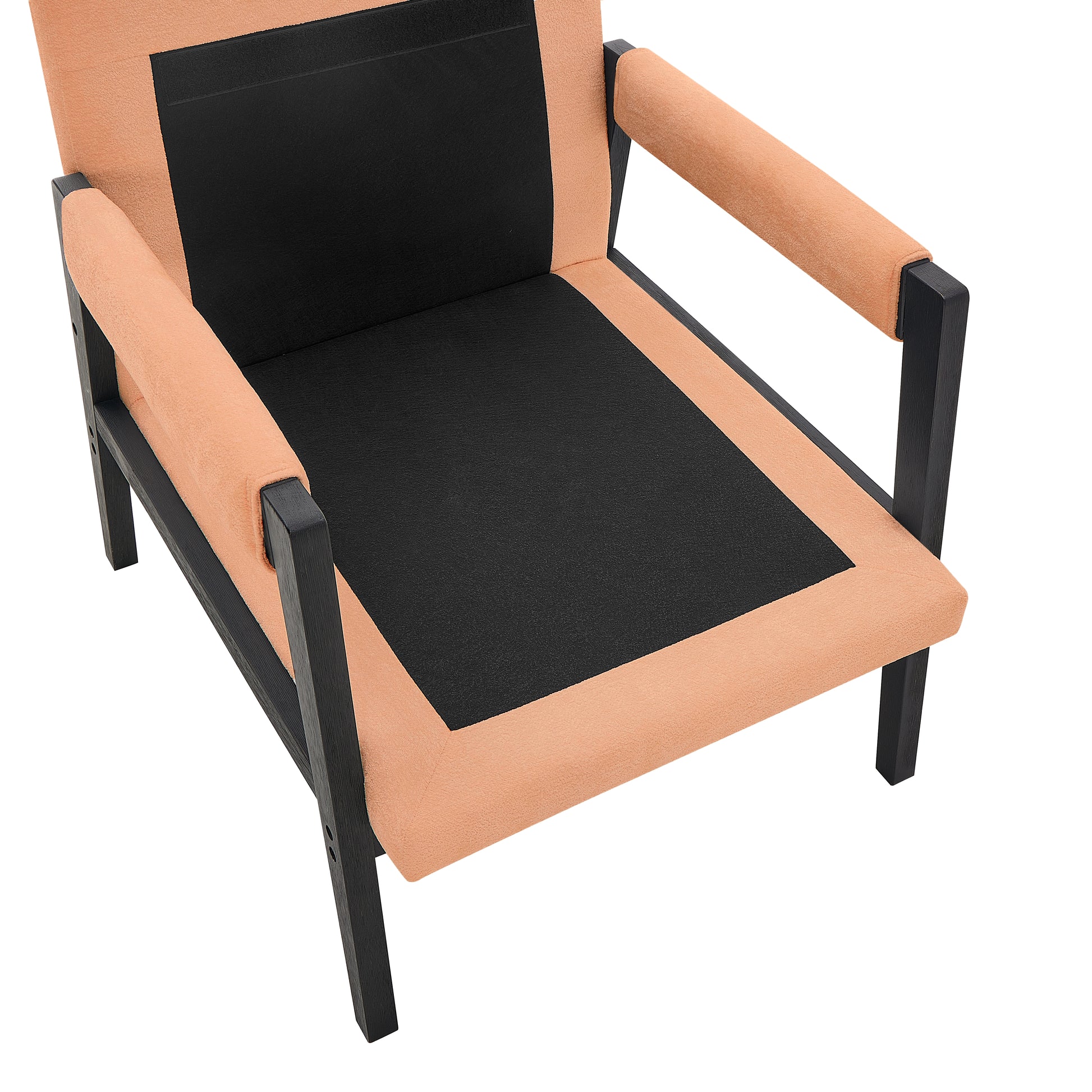 A modern accent chair with peach fabric upholstery and black accents
