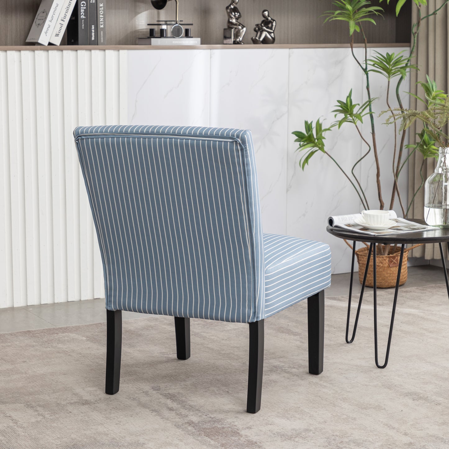 Blue striped accent chair with clean lines perfect for a modern living room
