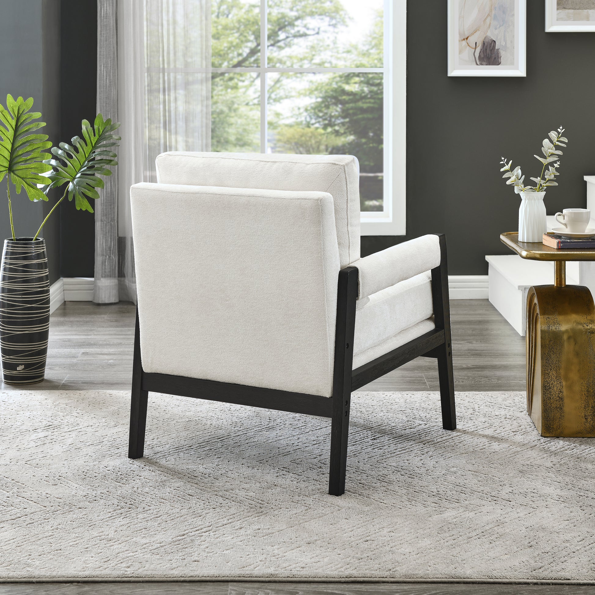 Cream boucle accent chair with dark wood frame modern design