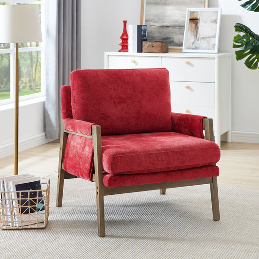 Red velvet armchair with wooden frame and plush cushions modern accent chair