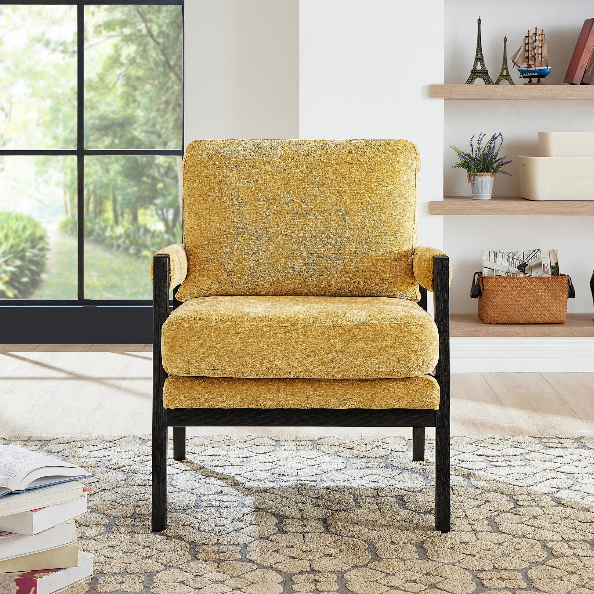 Textured mustard yellow armchair with black metal frame perfect for a cozy reading nook