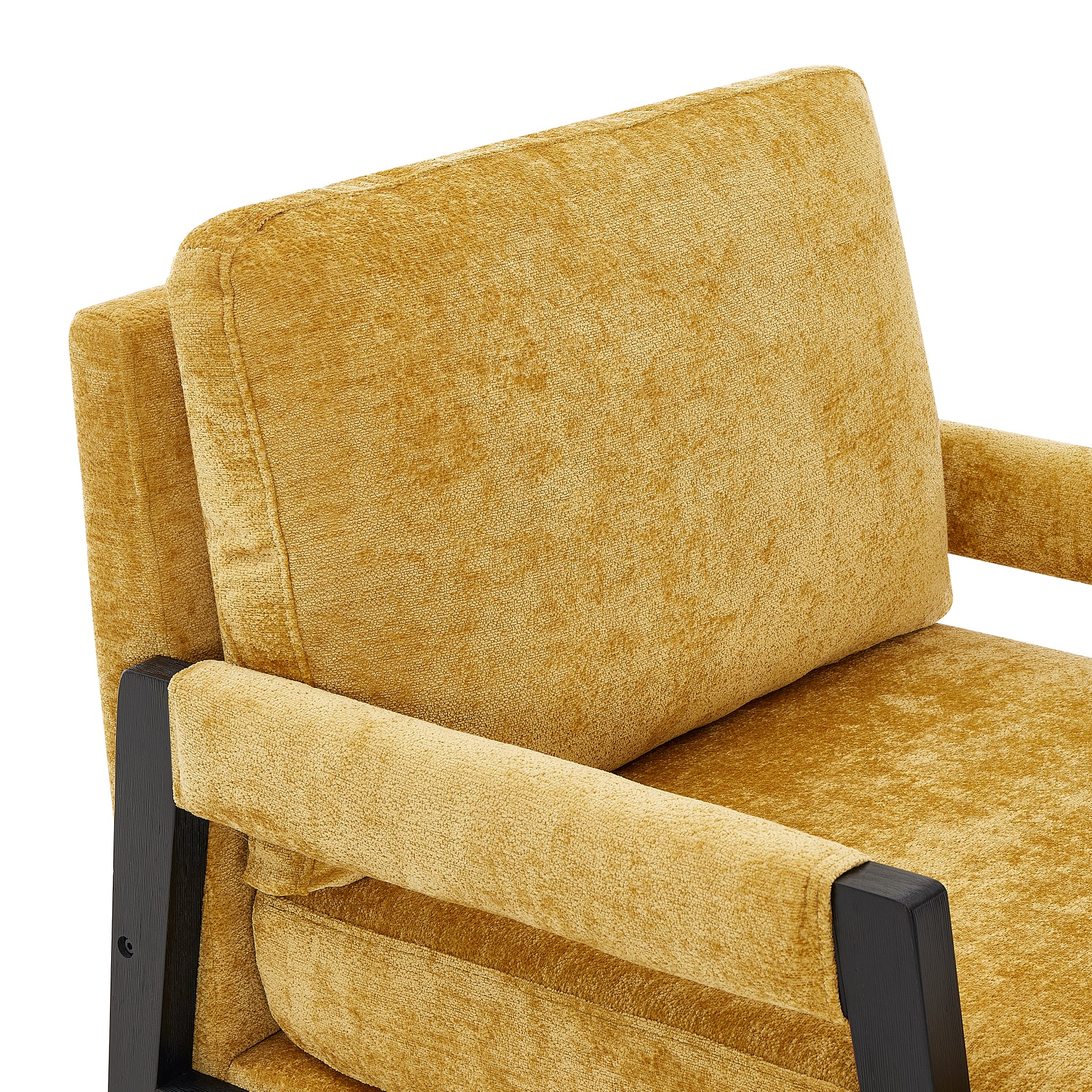 Velvet armchair in mustard yellow with a textured finish and dark wood armrests