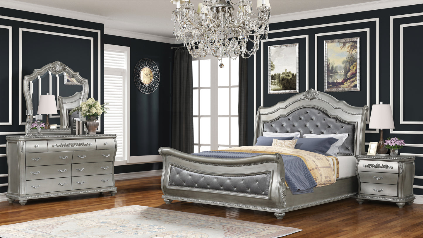 Luxurious silver tufted sleigh bed with crystal accents and ornate detailing