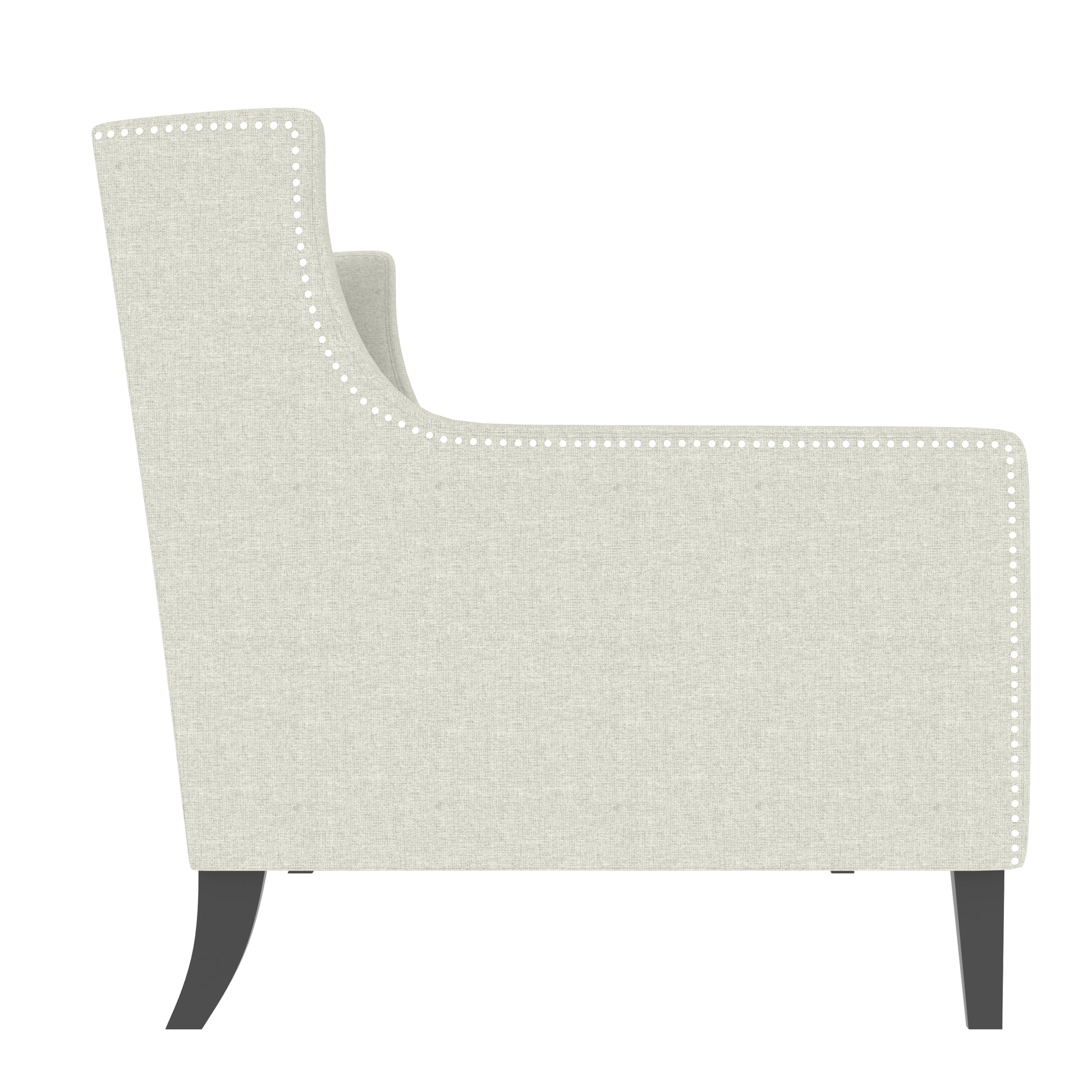 Cream upholstered armchair with nailhead trim and dark tapered legs