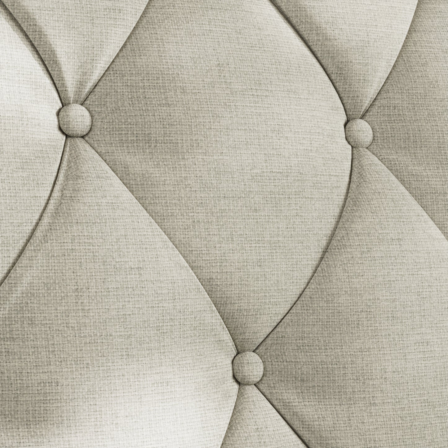 Closeup of light beige linen fabric with diamond tufting and button details