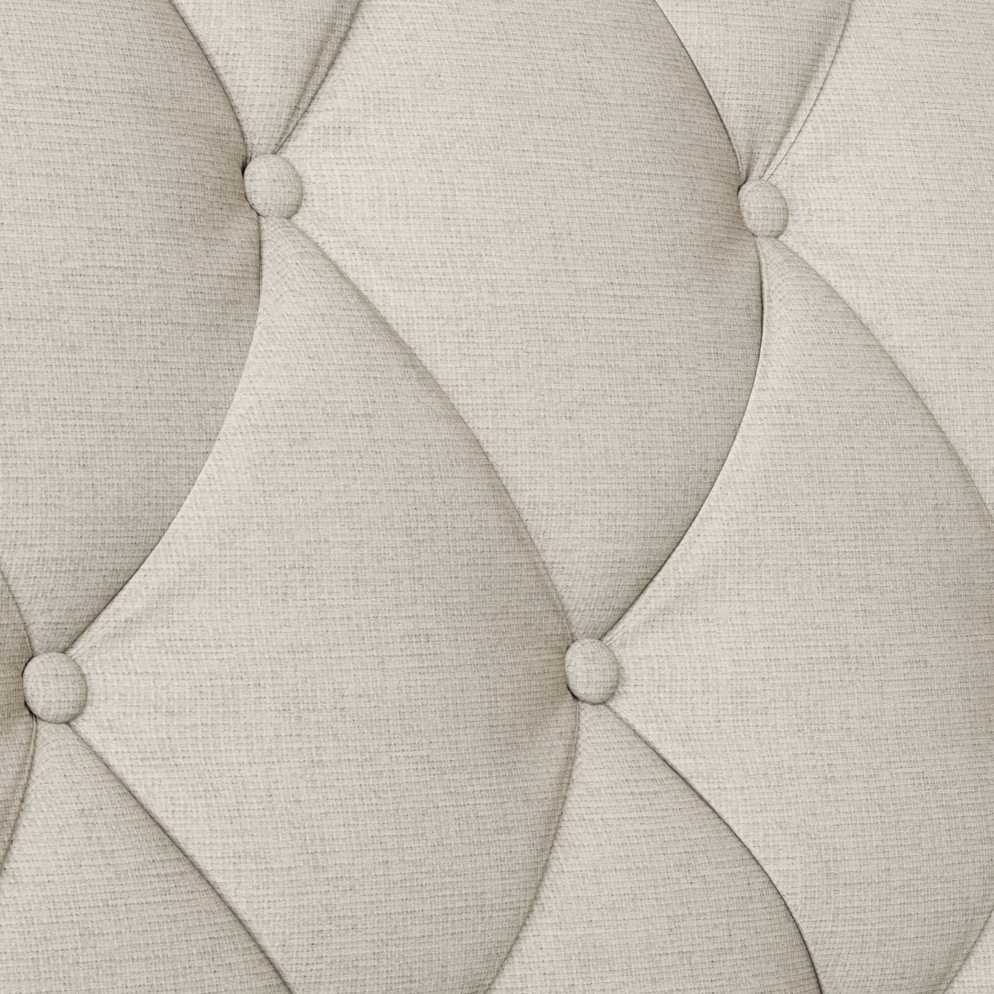 Closeup of light beige linen fabric with diamond tufting and button details