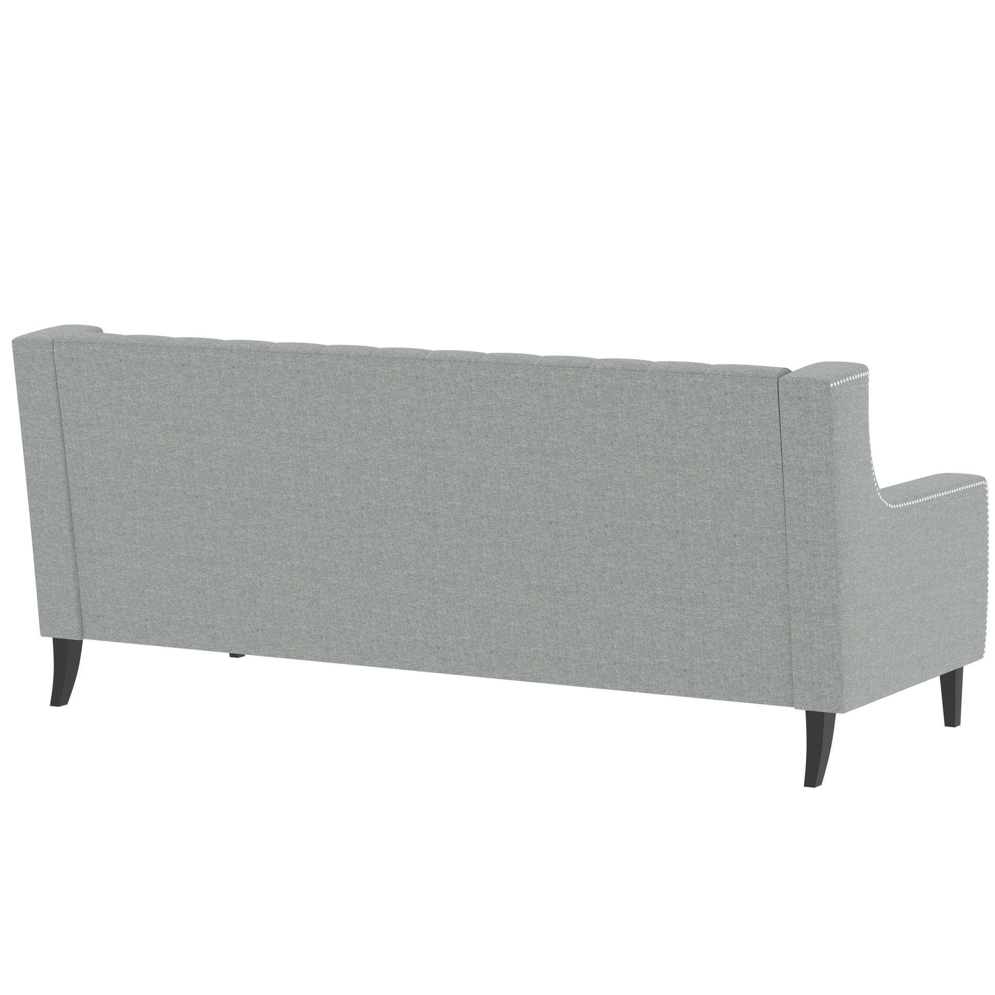 Tufted grey fabric sofa showing back view with nailhead trim accents