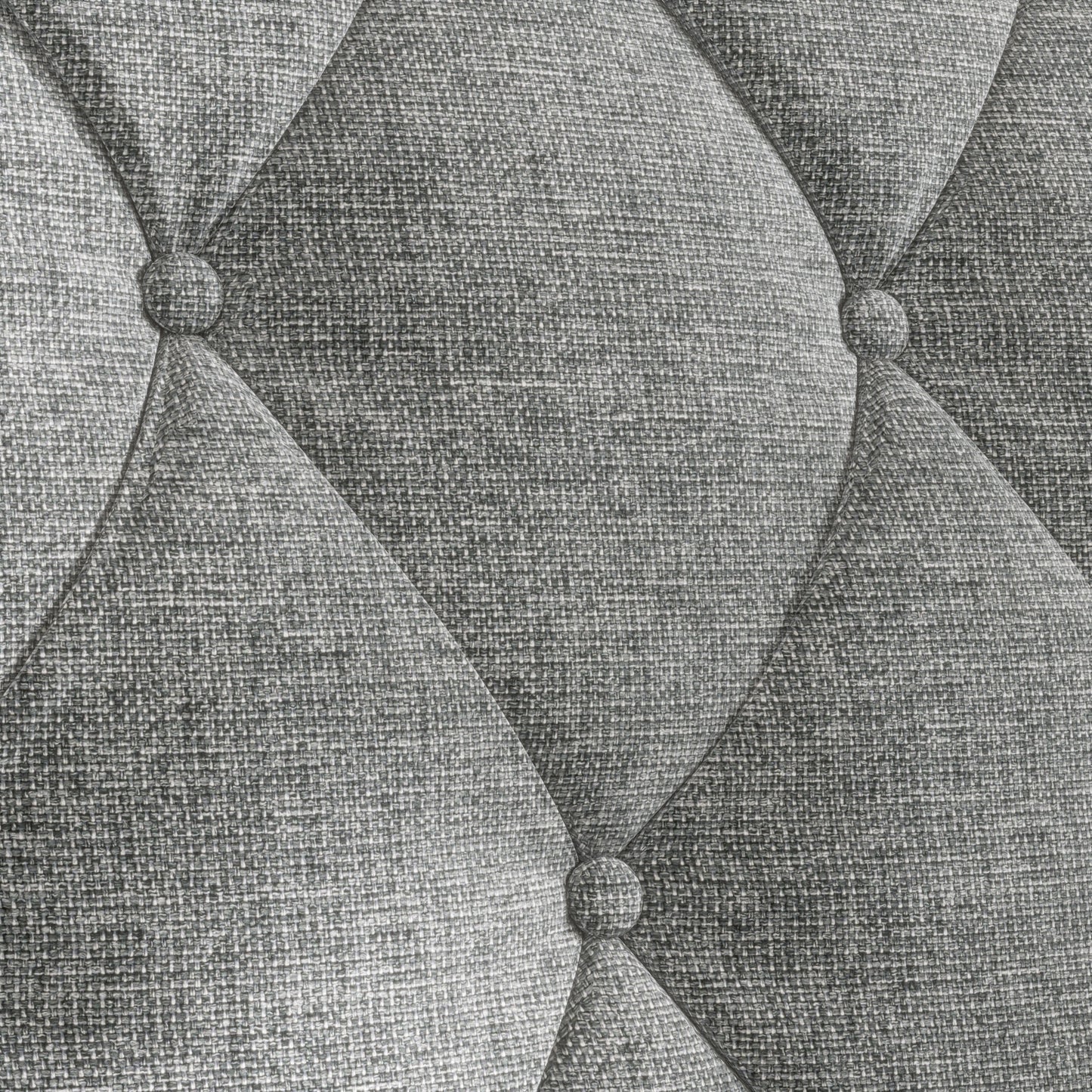 Closeup of grey tufted fabric texture with diamond pattern ideal for upholstery