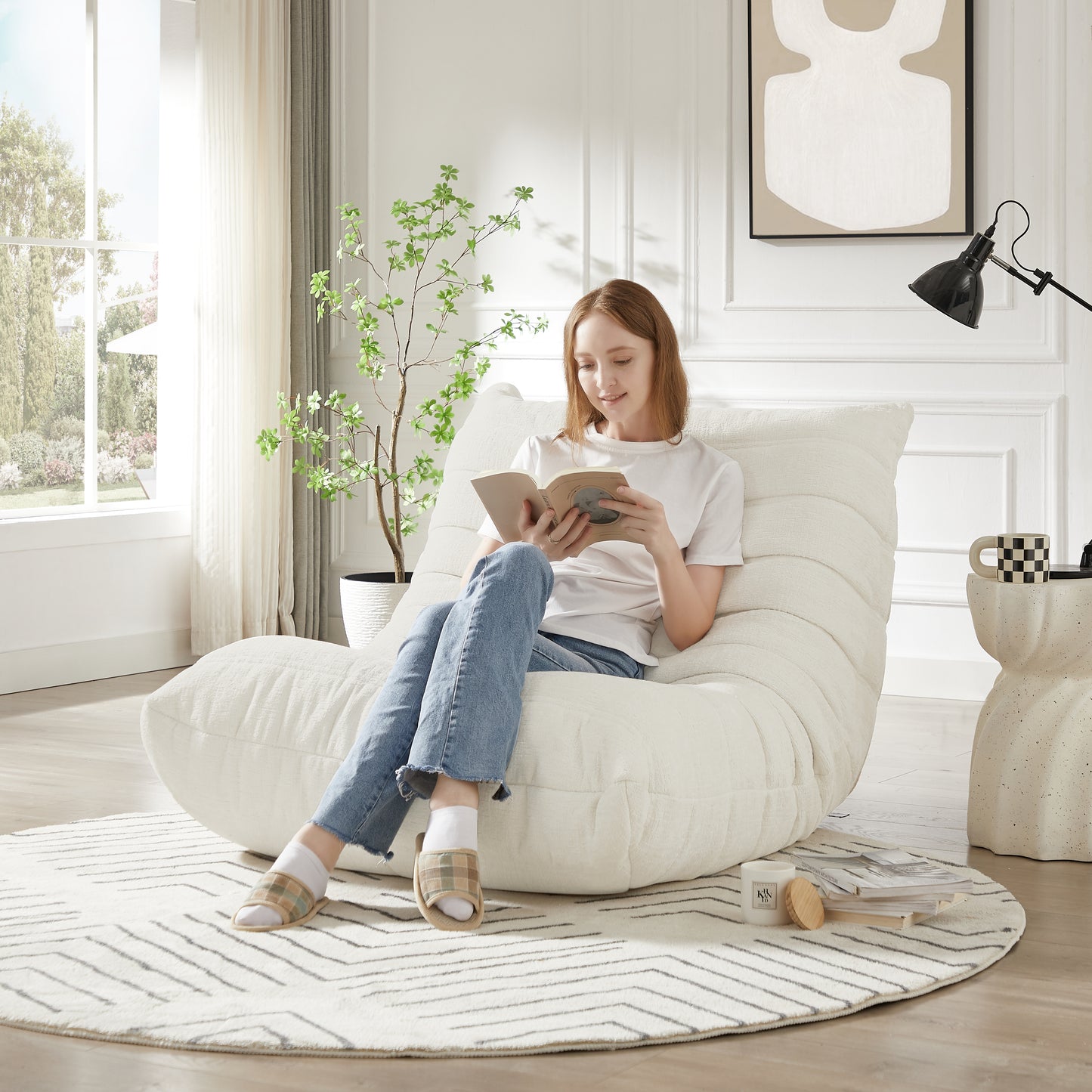 Plush white bean bag chair with channel stitching perfect for comfortable lounge seating