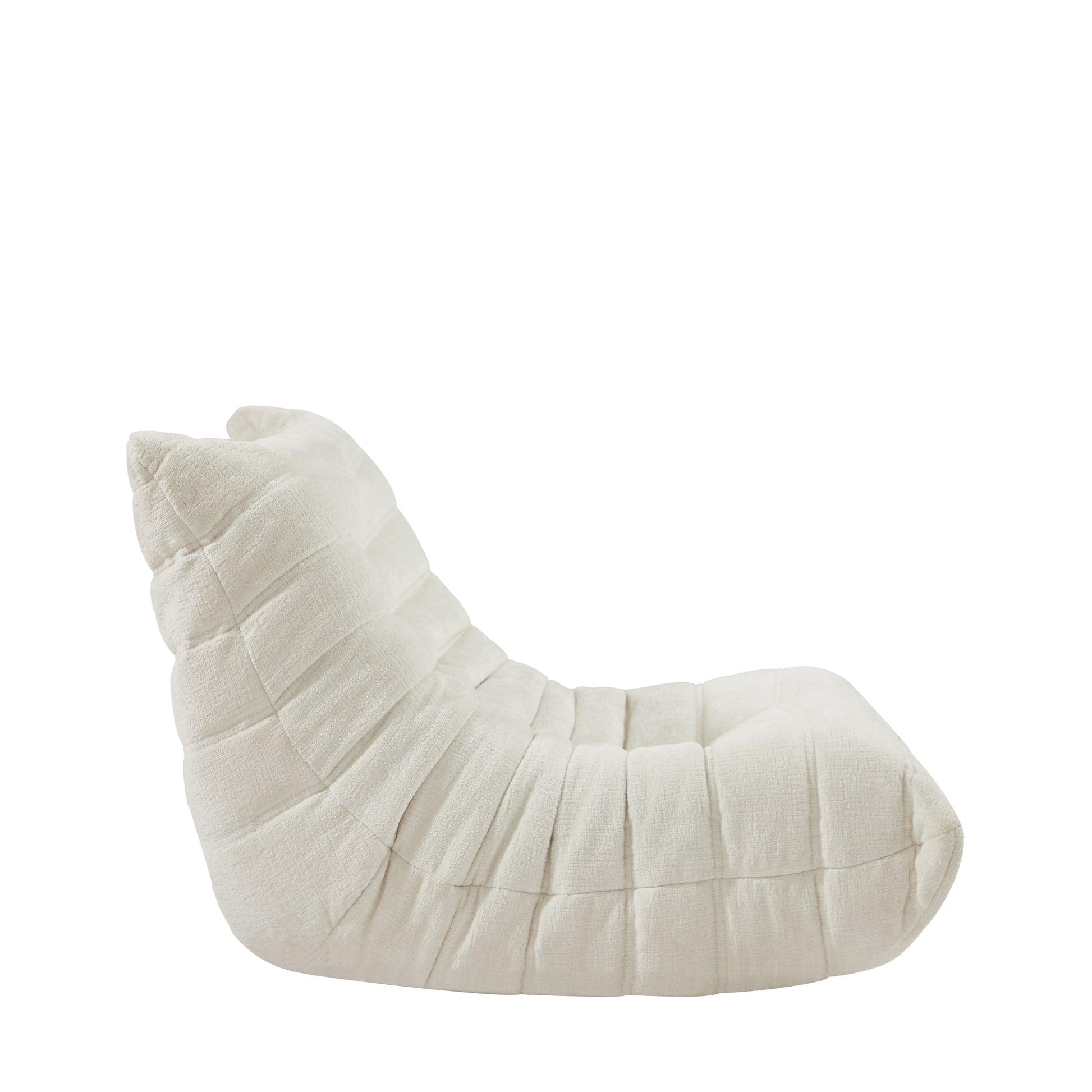 Plush ivory tufted lounge chair with channeled upholstery and comfortable seating