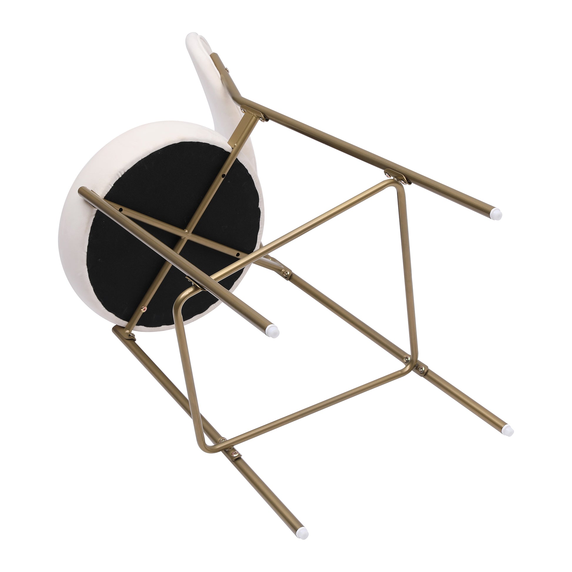 White velvet accent chair with gold metal base shown from underneath