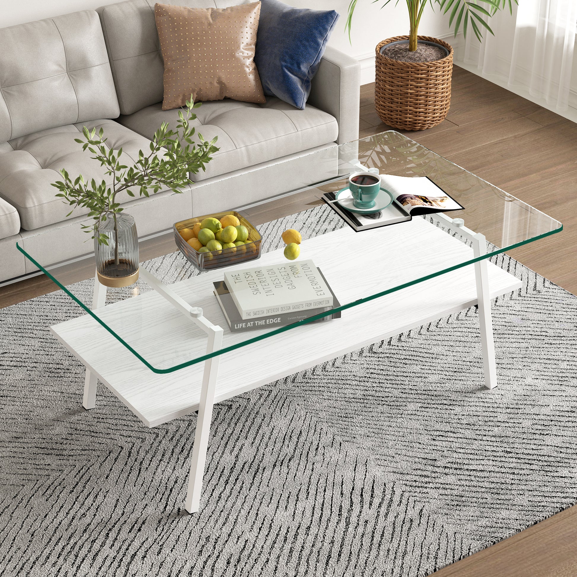 Modern white coffee table with a clear glass top perfect for living room decor