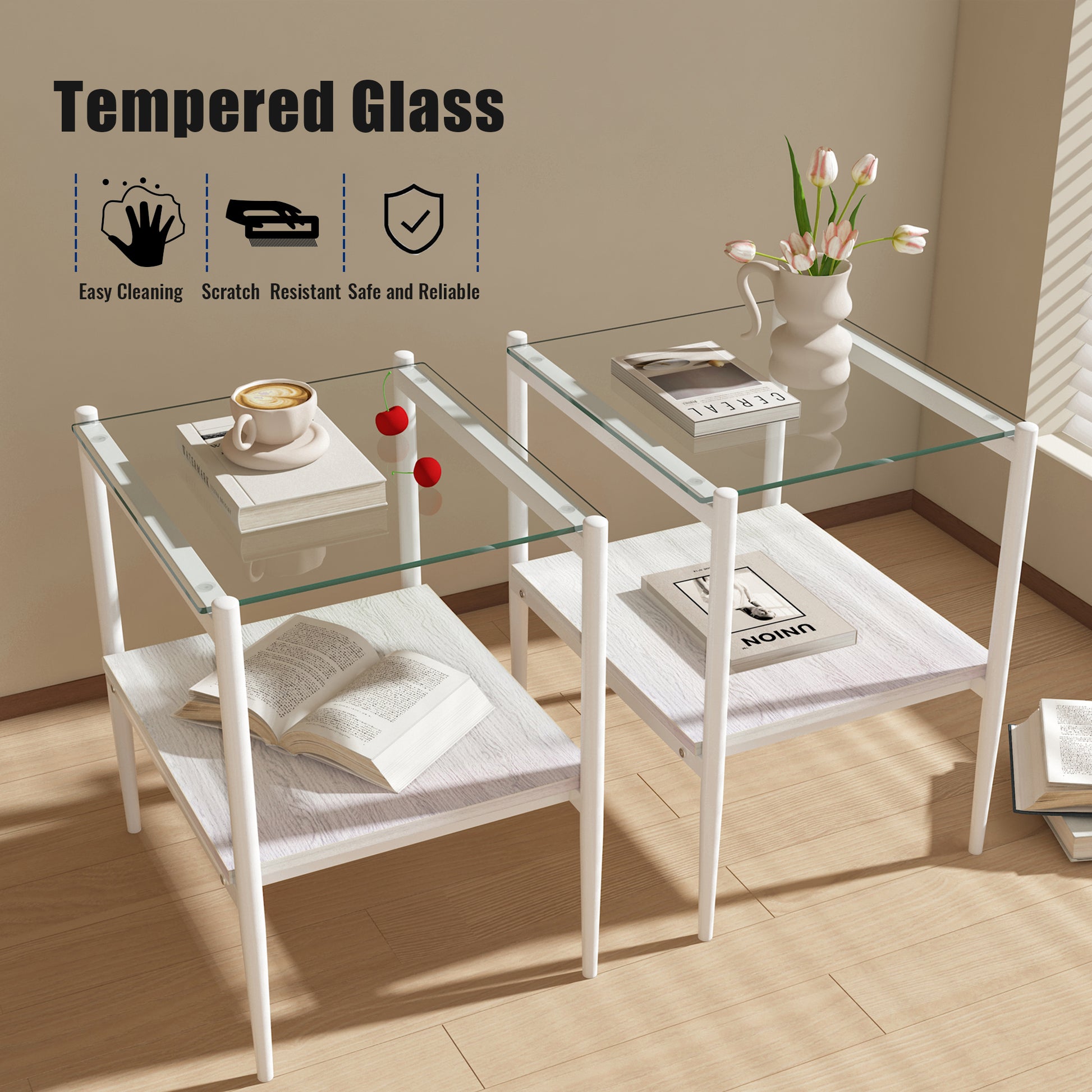 Two white metal end tables with tempered glass tops and woodpatterned shelves one with a coffee cup