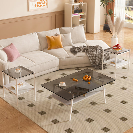 Modern glass coffee table with white frame and open lower shelf holding magazines
