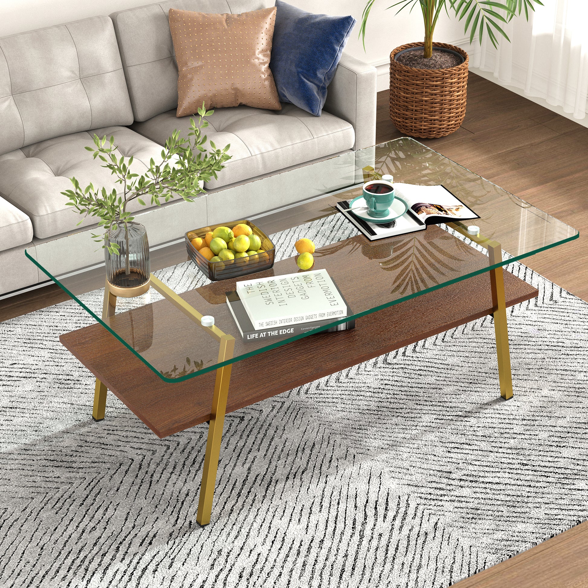 Modern glass coffee table with gold legs and dual shelves