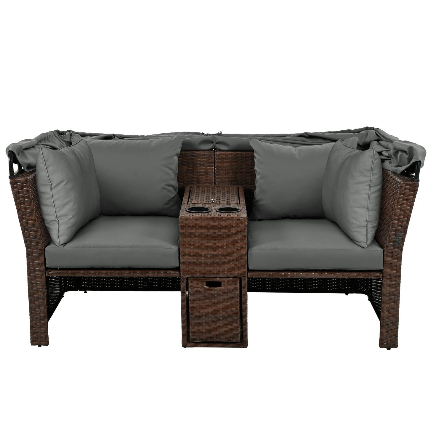 Brown wicker loveseat with gray cushions center console and protective cover
