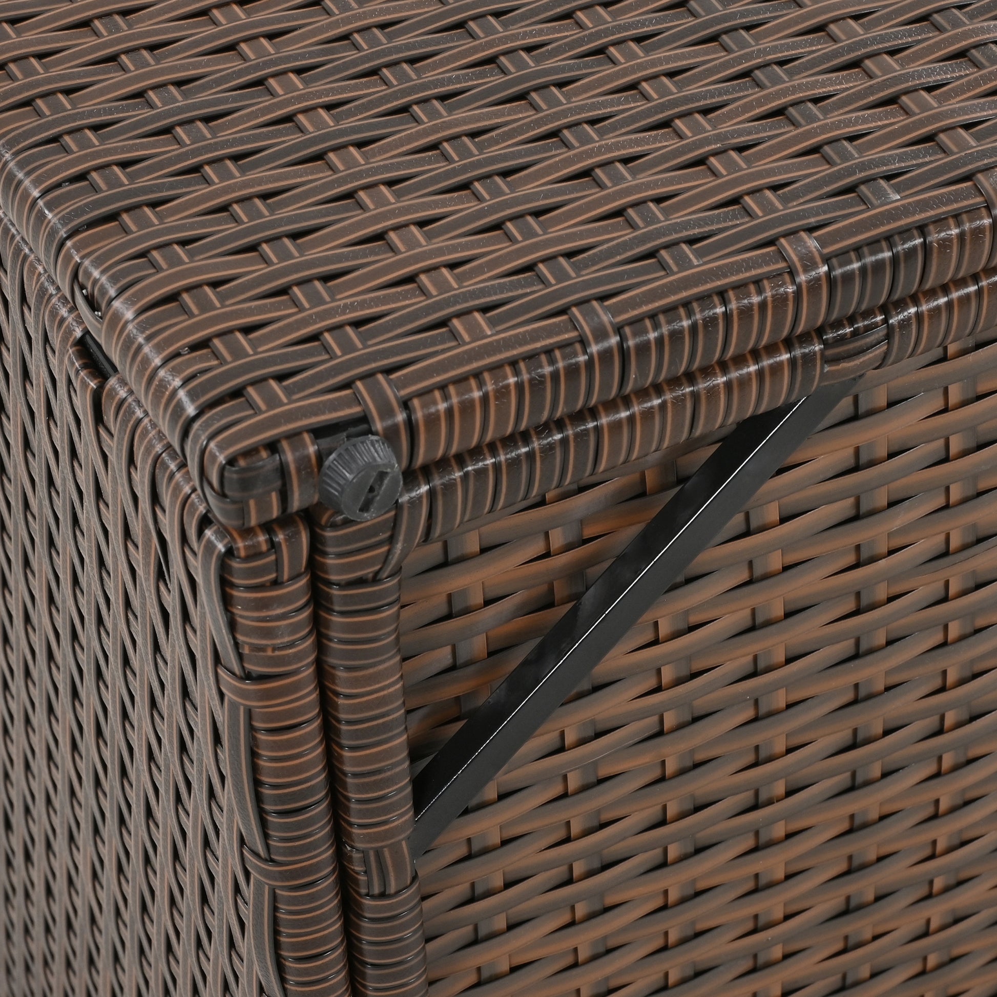 Brown rattan storage bench with black metal accents