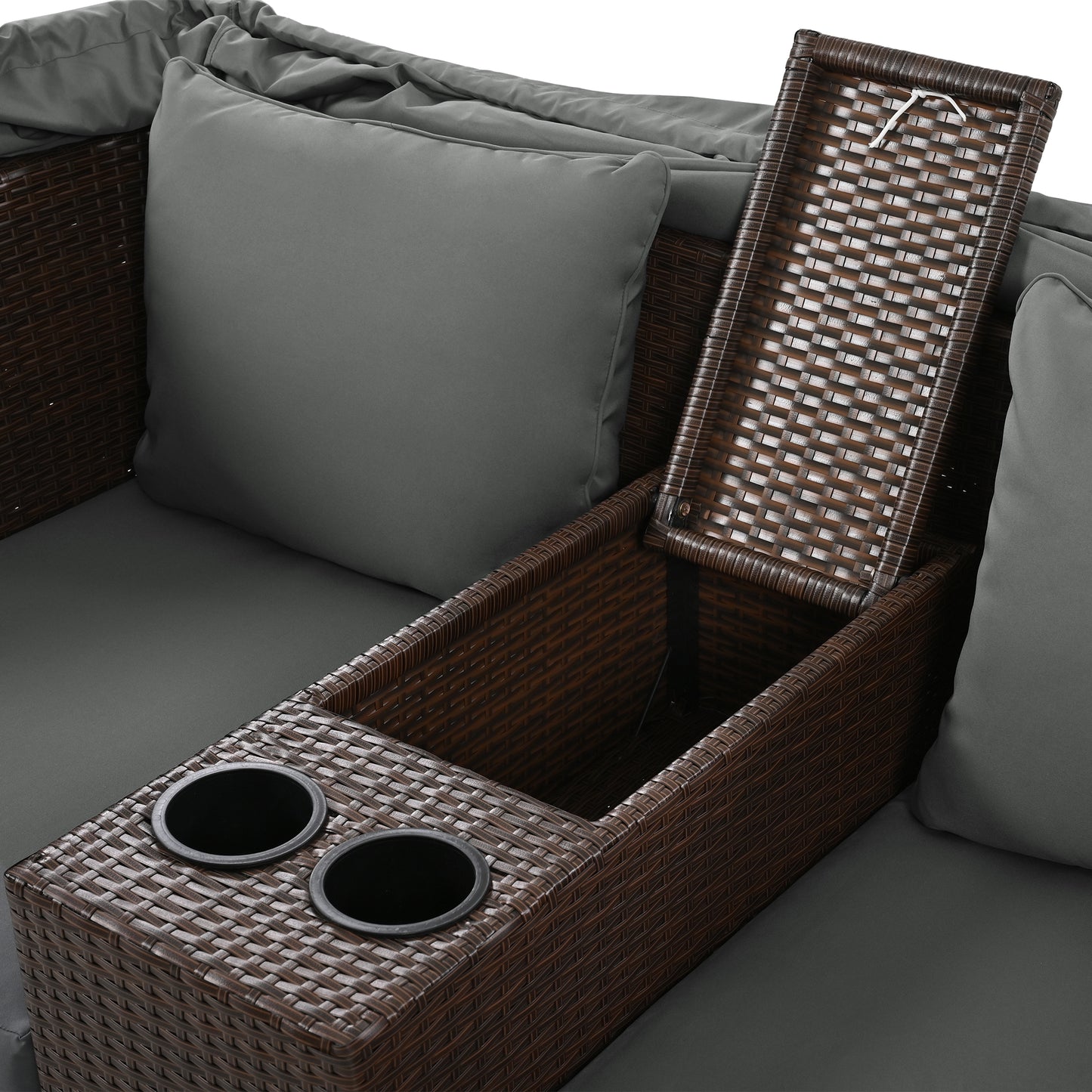 Brown wicker outdoor sofa with gray cushions featuring a builtin cooler and cup holders