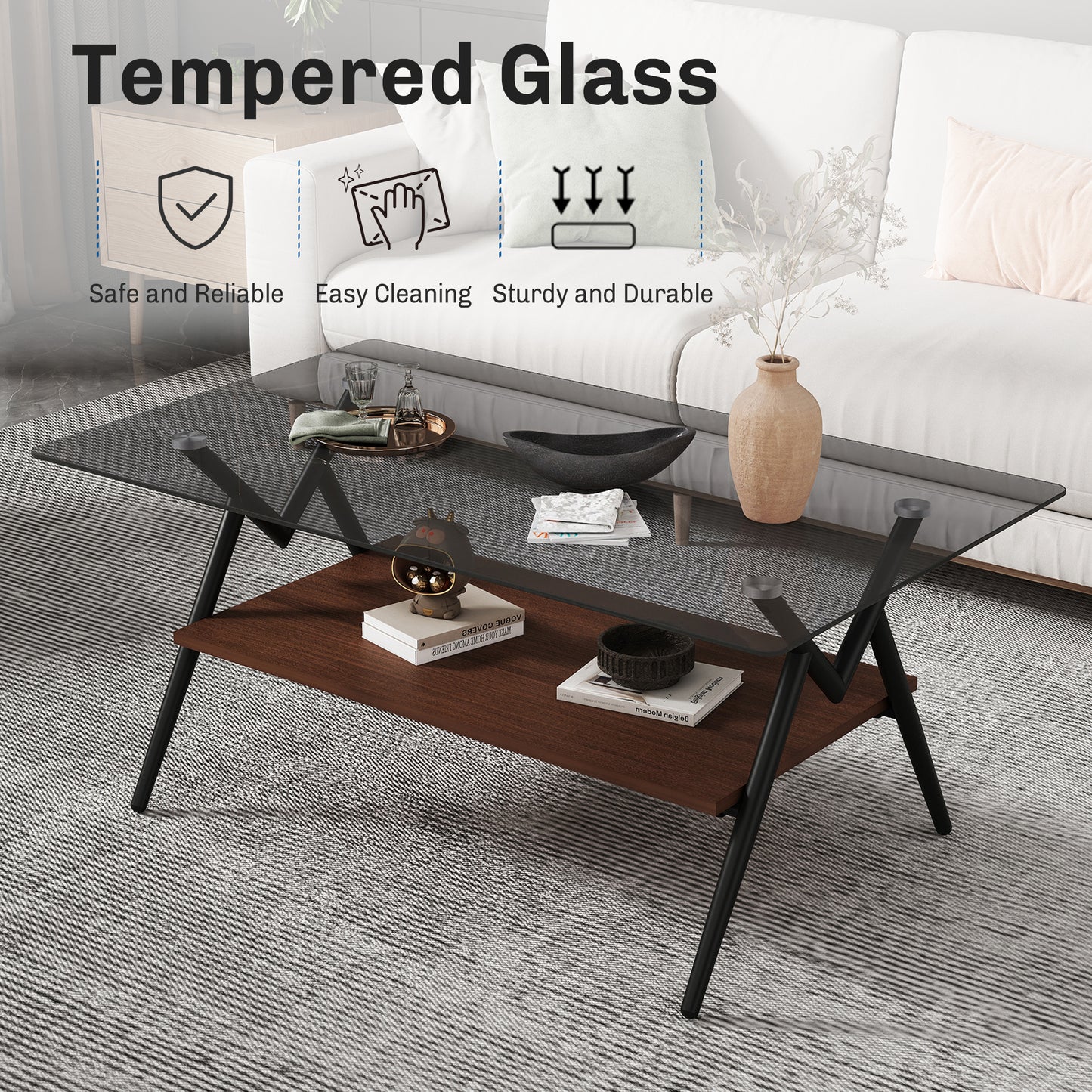 Modern coffee table with clear tempered glass top and dark wood shelf on black metal legs