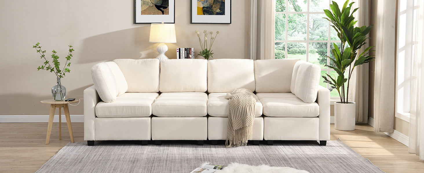 Cream modular sectional sofa with plush cushions and a cozy throw blanket
