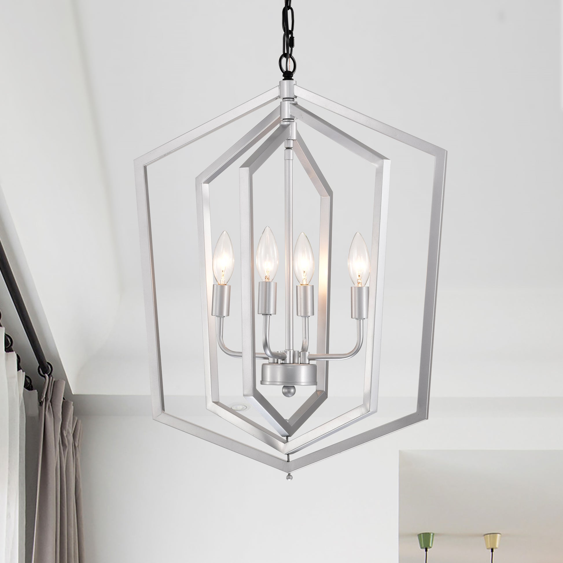 Brushed nickel modern geometric chandelier with four candle bulbs ideal for dining rooms