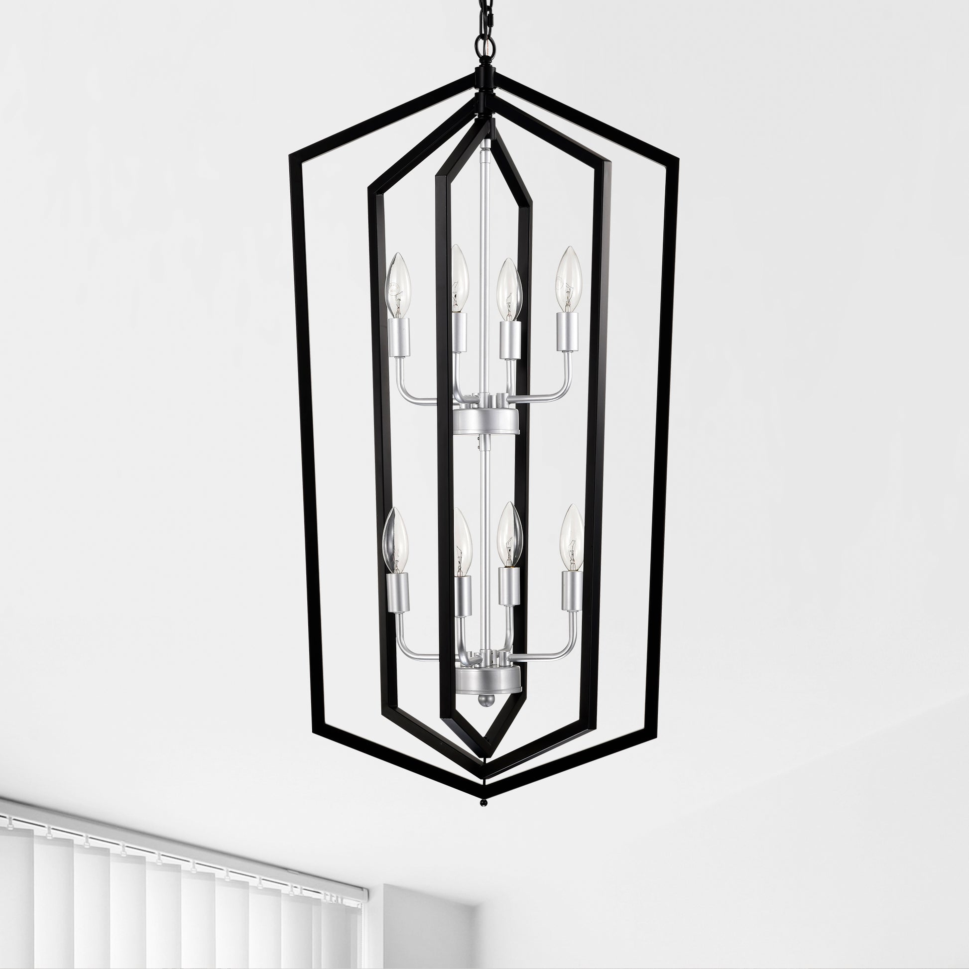 Geometric black metal lantern chandelier with silver accents and six candelabra bulbs