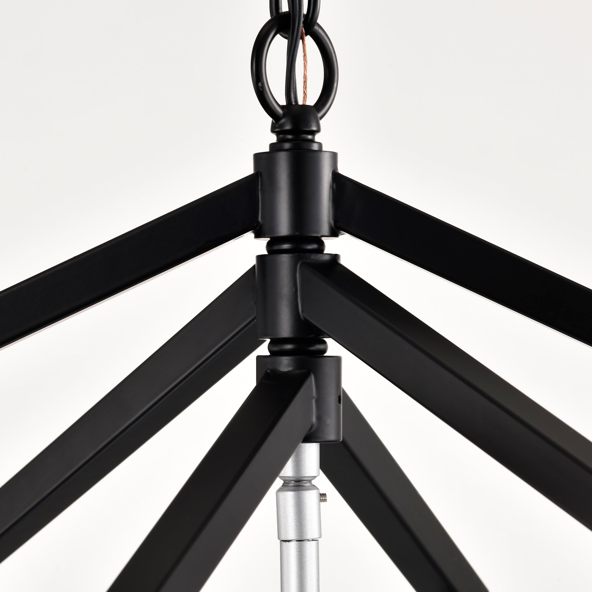 Black geometric chandelier frame with metal accents and suspension chain
