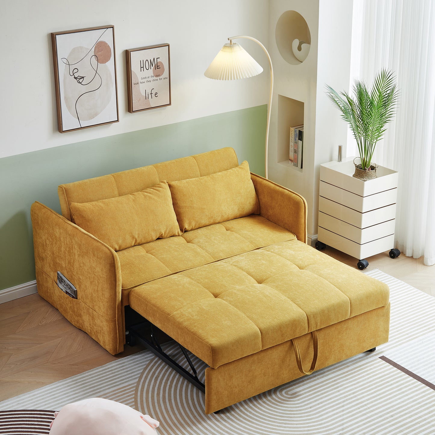 Mustard yellow fabric convertible sofa bed with plush cushions
